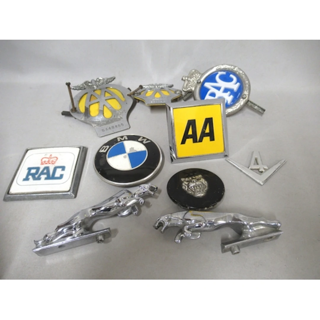 Two small Jaguar chrome car mascots, together with a quantit...