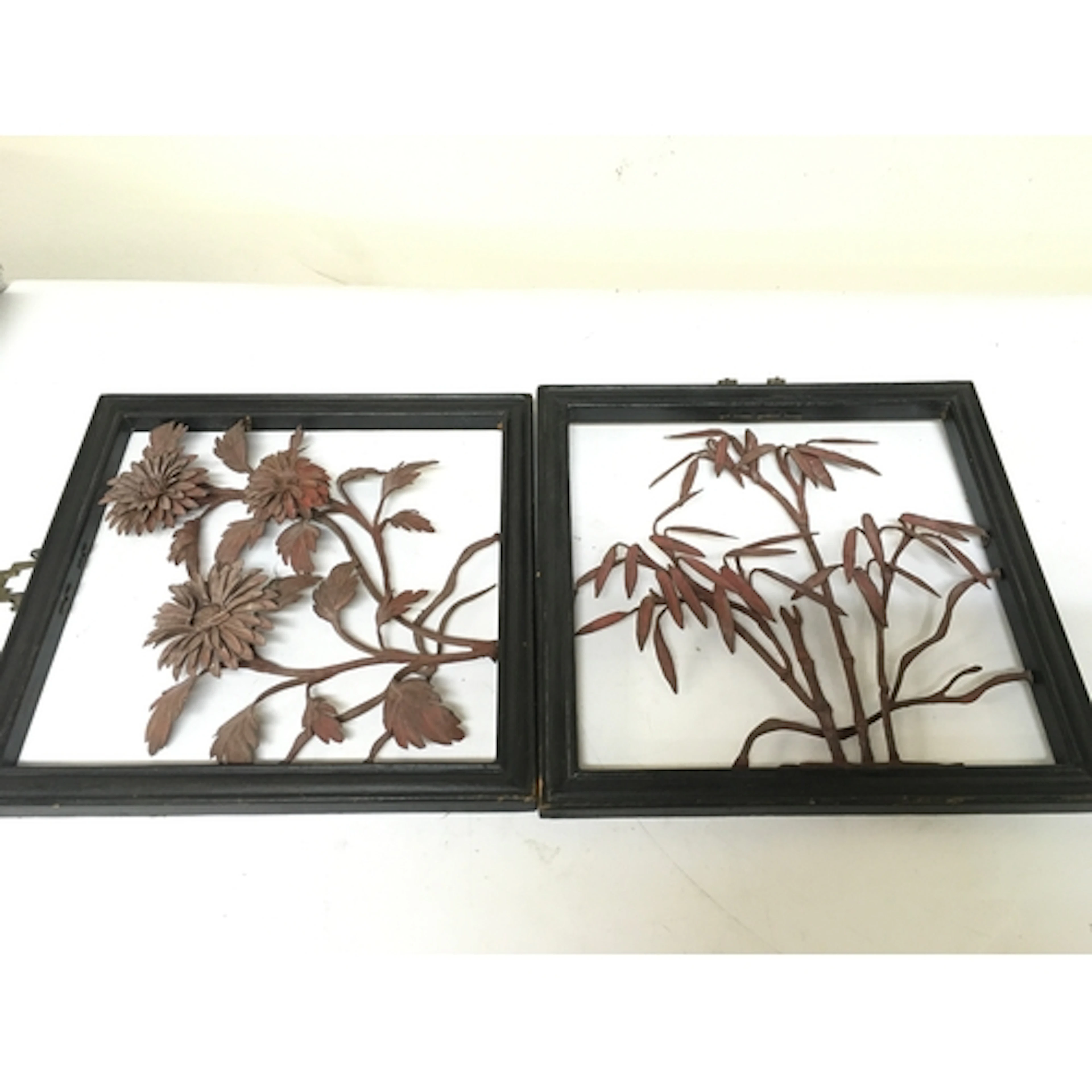 Oriental metal floral hangings. 25x25cm