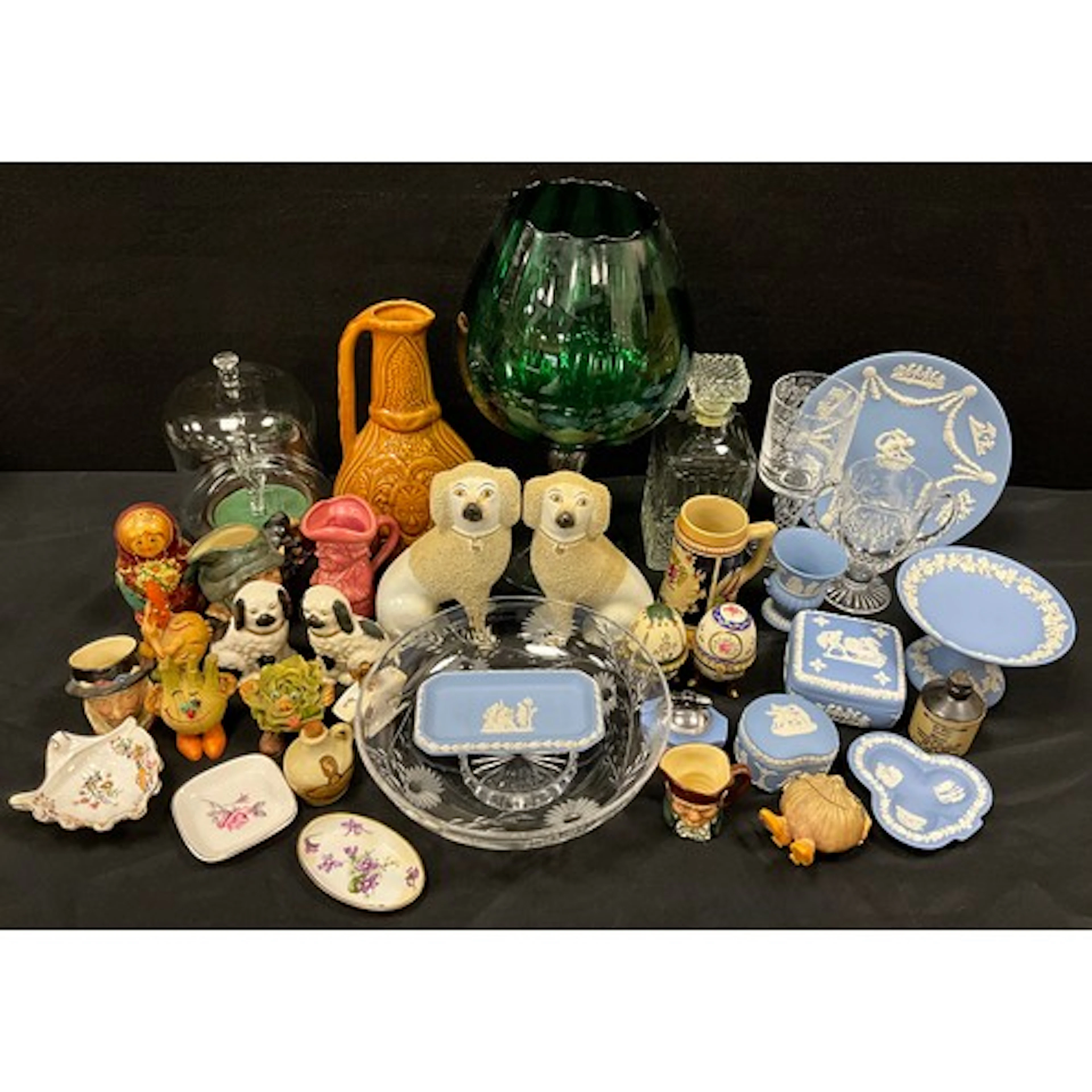Ceramics - a pair of 19th century Staffordshire poodle dogs,...