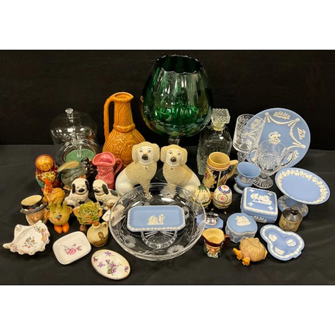 Ceramics - a pair of 19th century Staffordshire poodle dogs,...