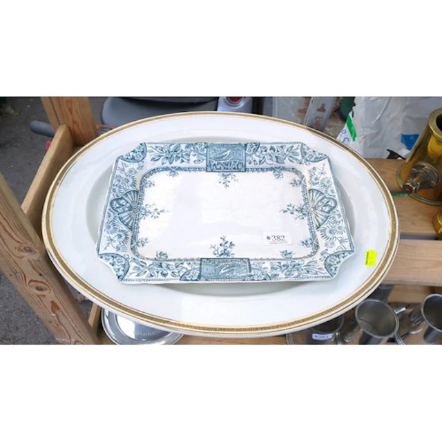 Two English earthenware serving platters: one rectangular, b...
