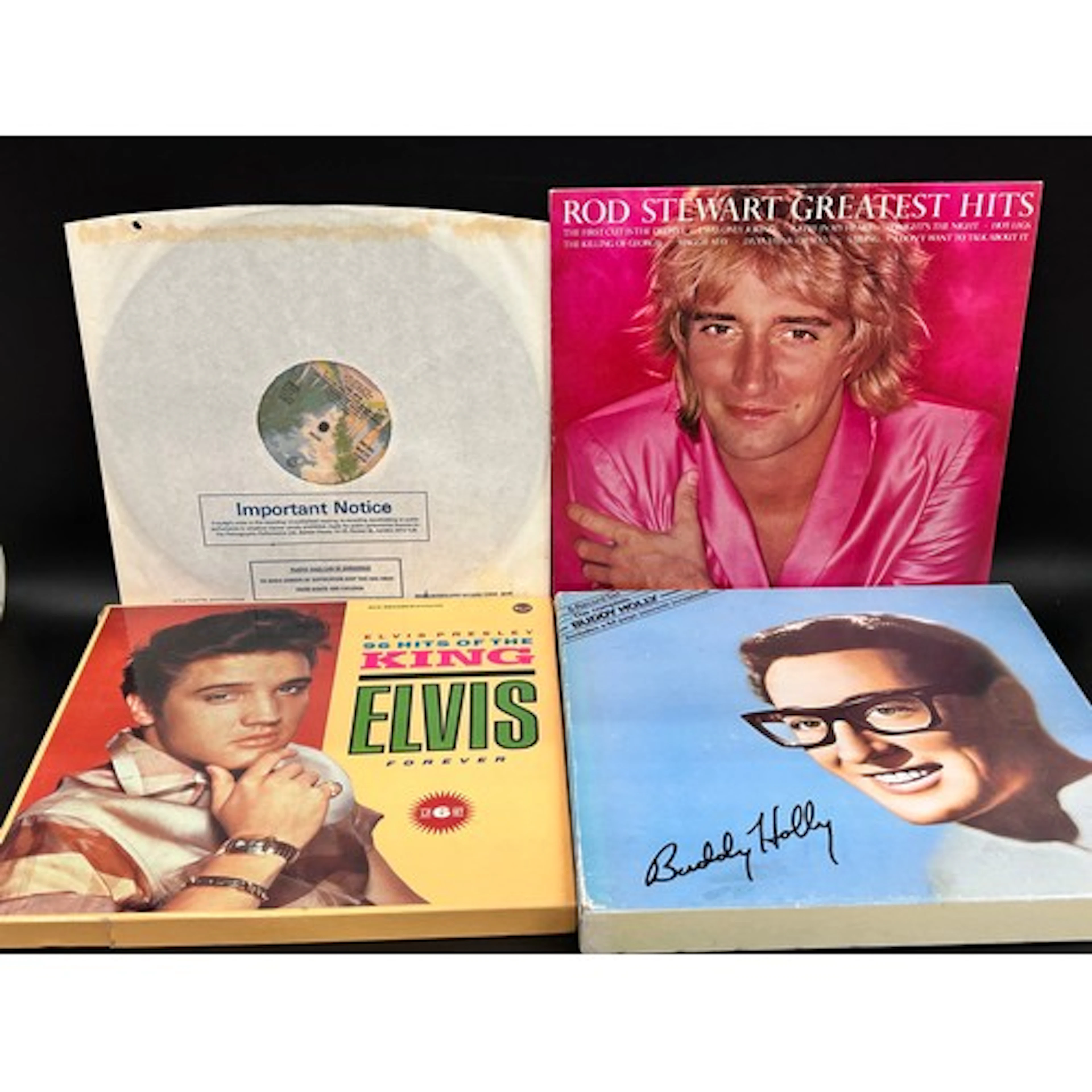 A collection of LP records including Buddy Holly six record ...