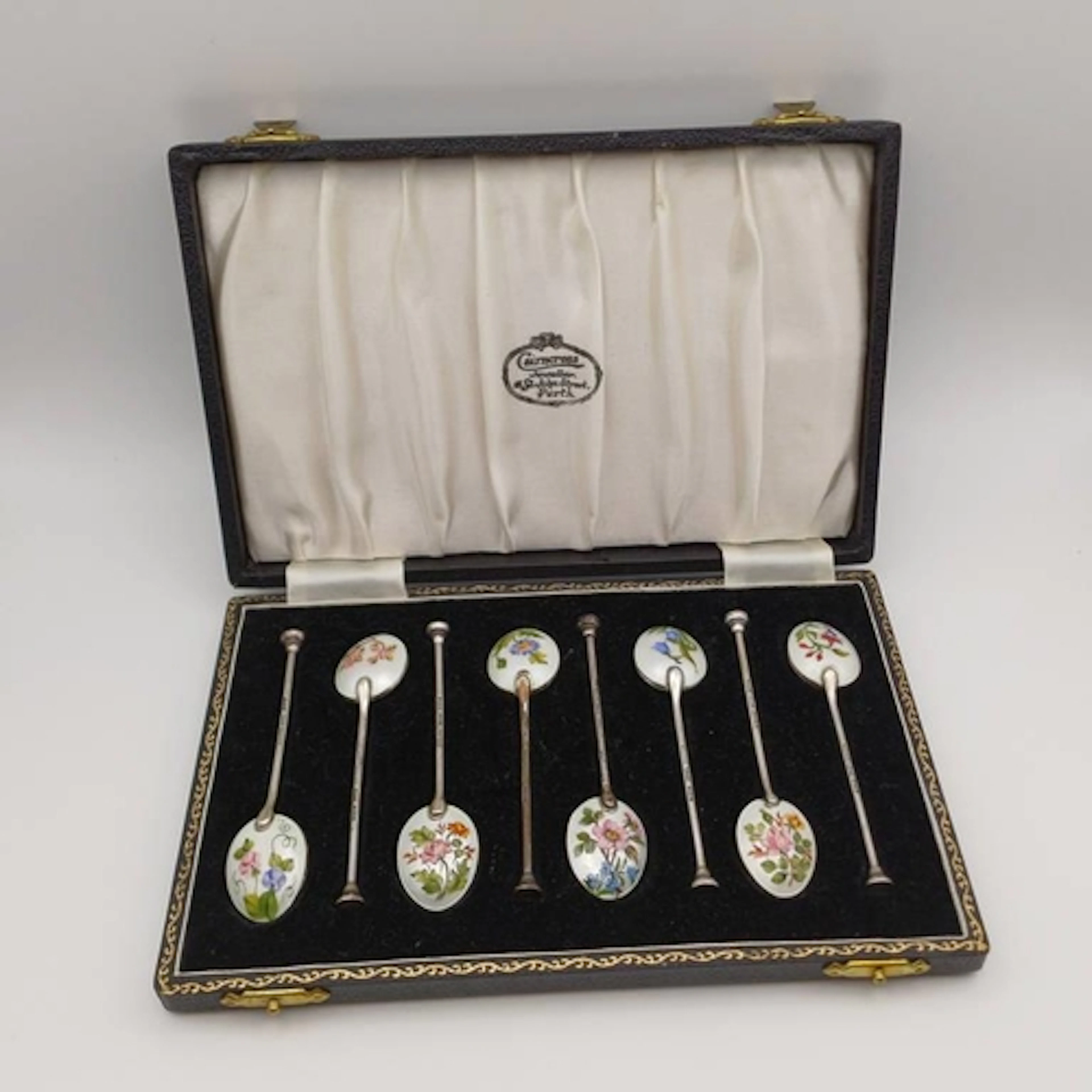 A SET OF 8 SILVER COFFEE SPOONS WITH FLORAL ENAMEL BOWLS BY ...