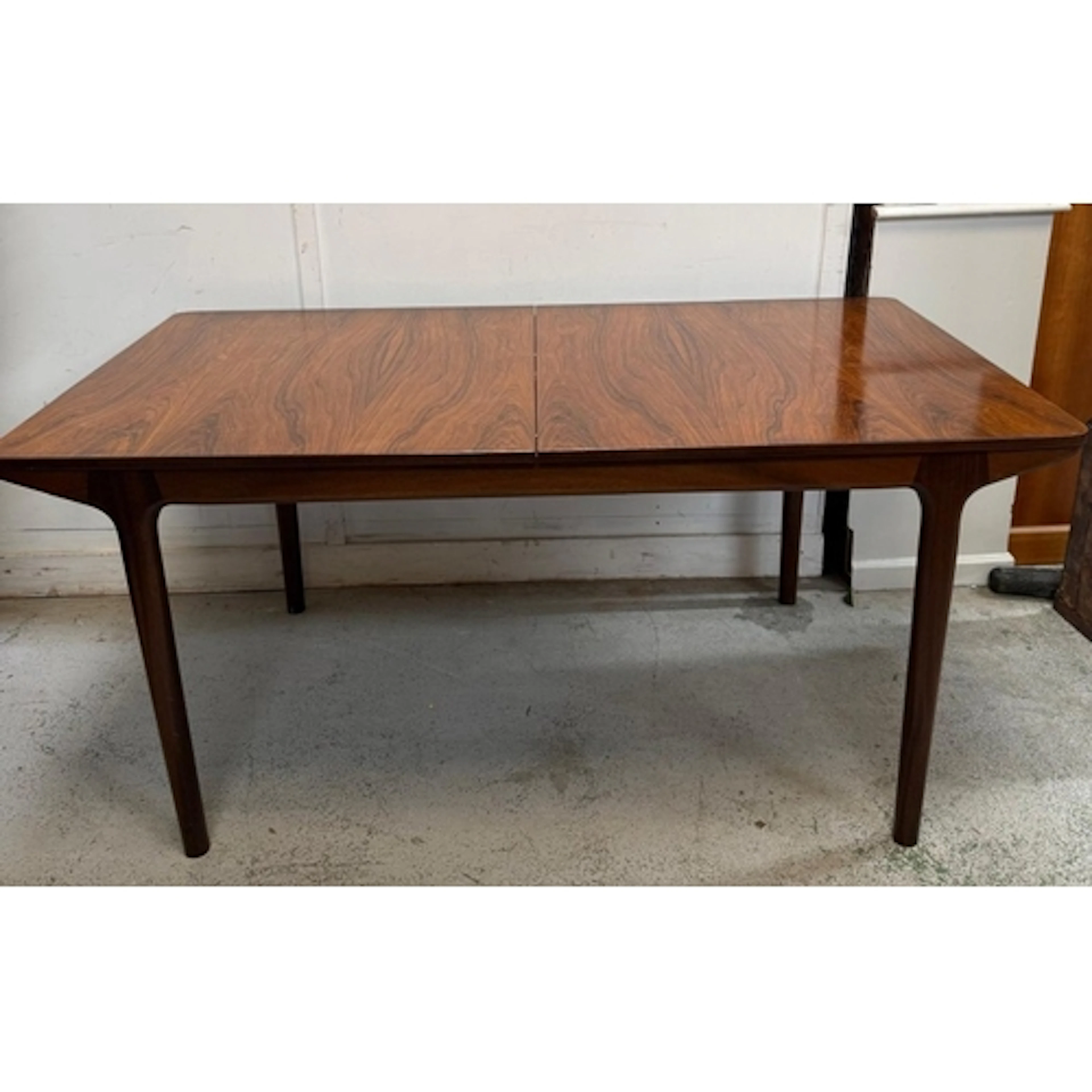 A mid-century Mcintosh extendable dining table with two inte...