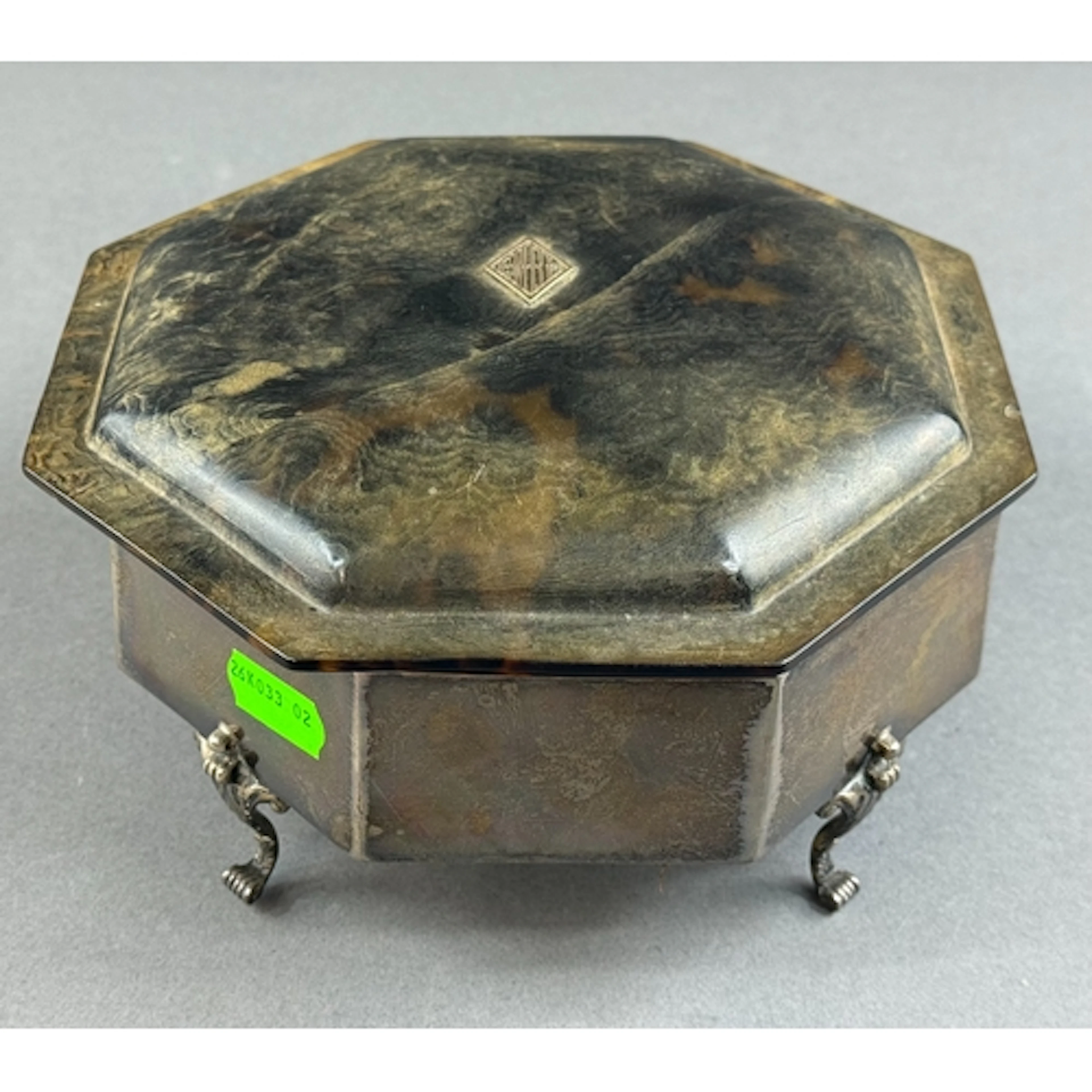 Silver: a large octagonal dressing table box by Charles Henr...