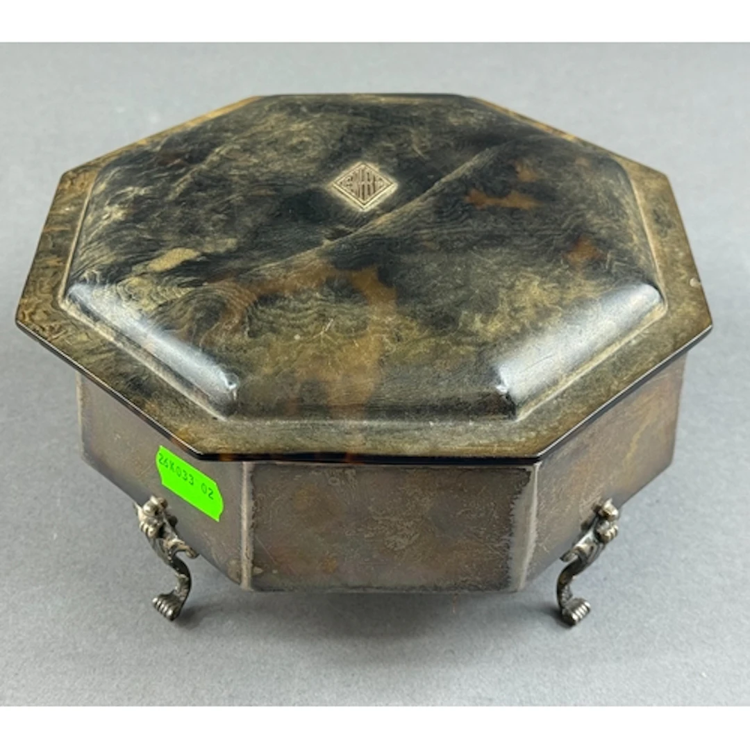 Silver: a large octagonal dressing table box by Charles Henr...