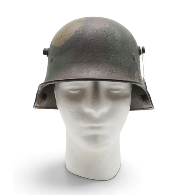 An interesting German WW1 MI6 camouflaged steel helmet or St...
