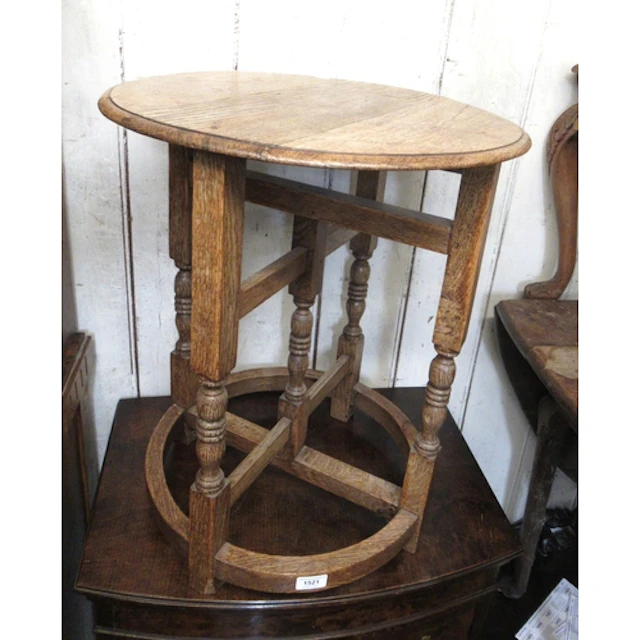 Circular oak occasional table, together with a rectangular o...