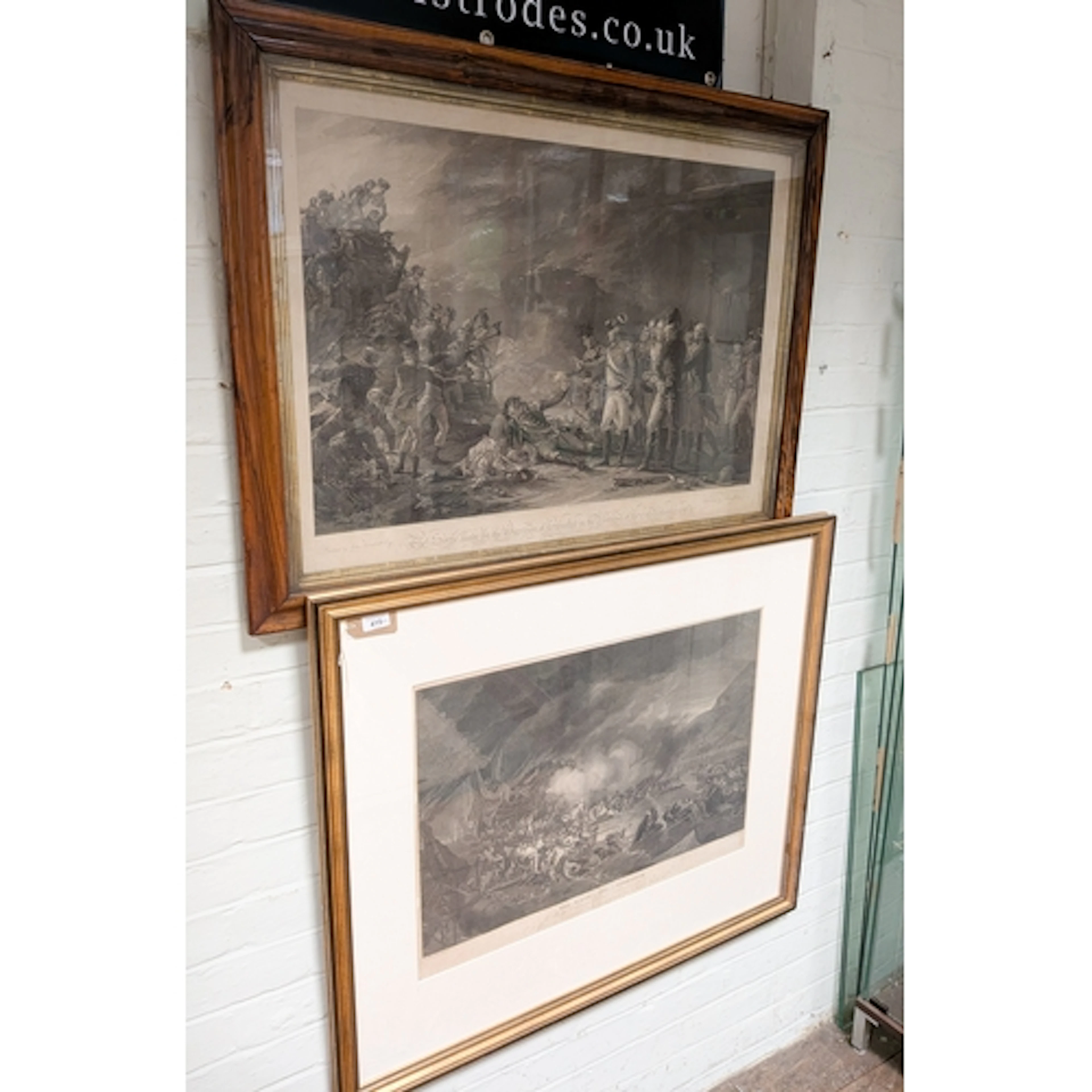 Two large antique black and prints in glazed frames, one of ...