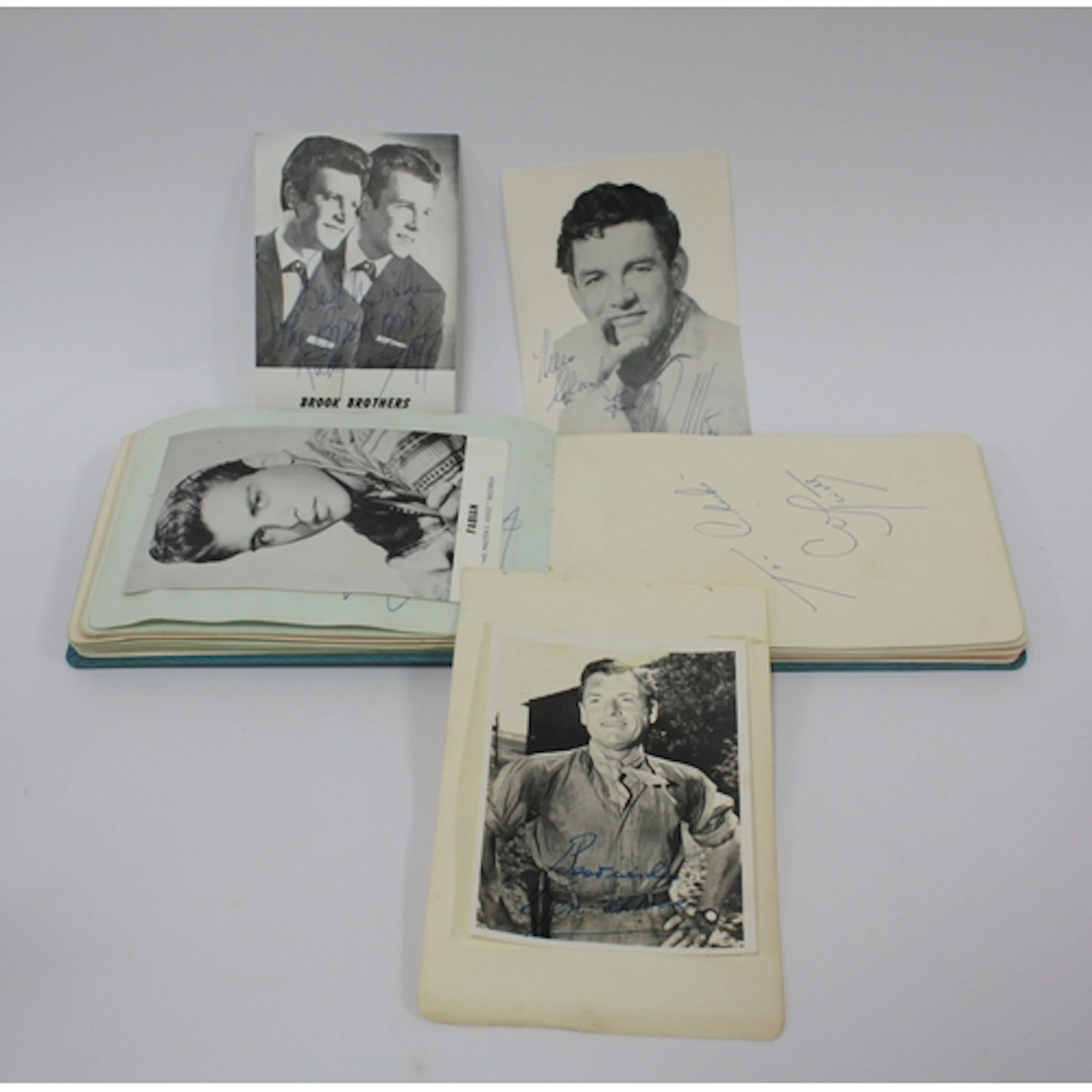 A Contage Autograph Album containing many pen signatures to ...