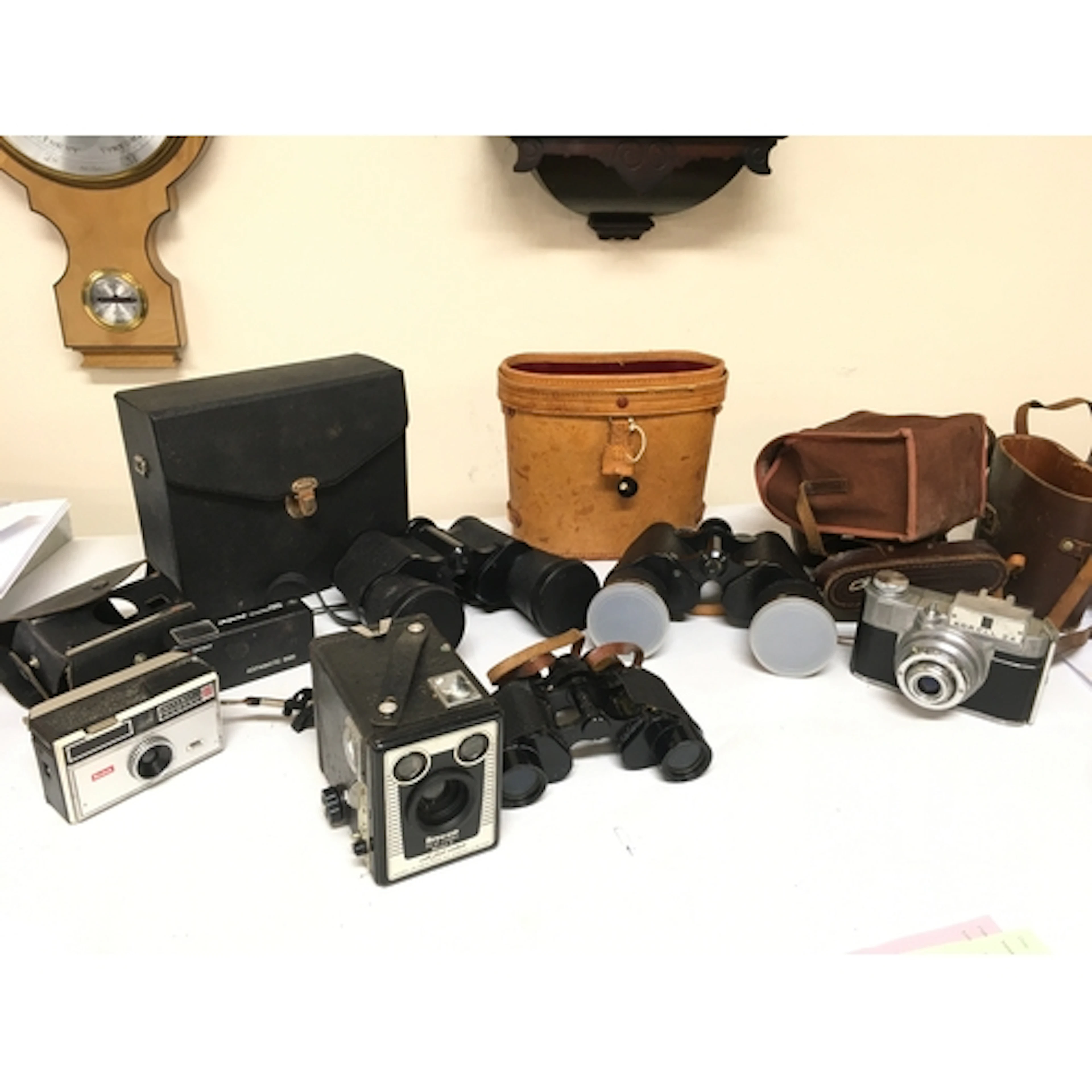 Binoculars and cameras Brownie Six-20 model E, Kodak Instama...