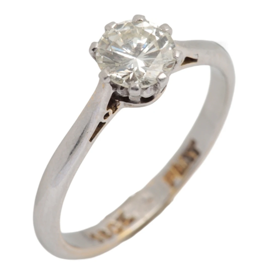 A diamond solitaire ring, claw-set with a brilliant-cut diam...