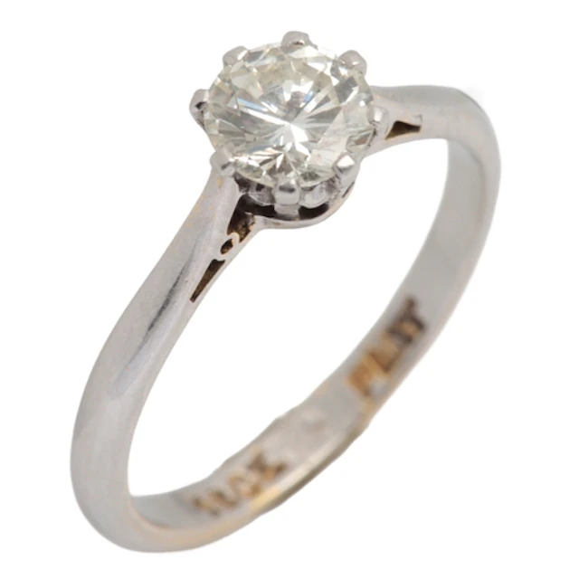 A diamond solitaire ring, claw-set with a brilliant-cut diam...