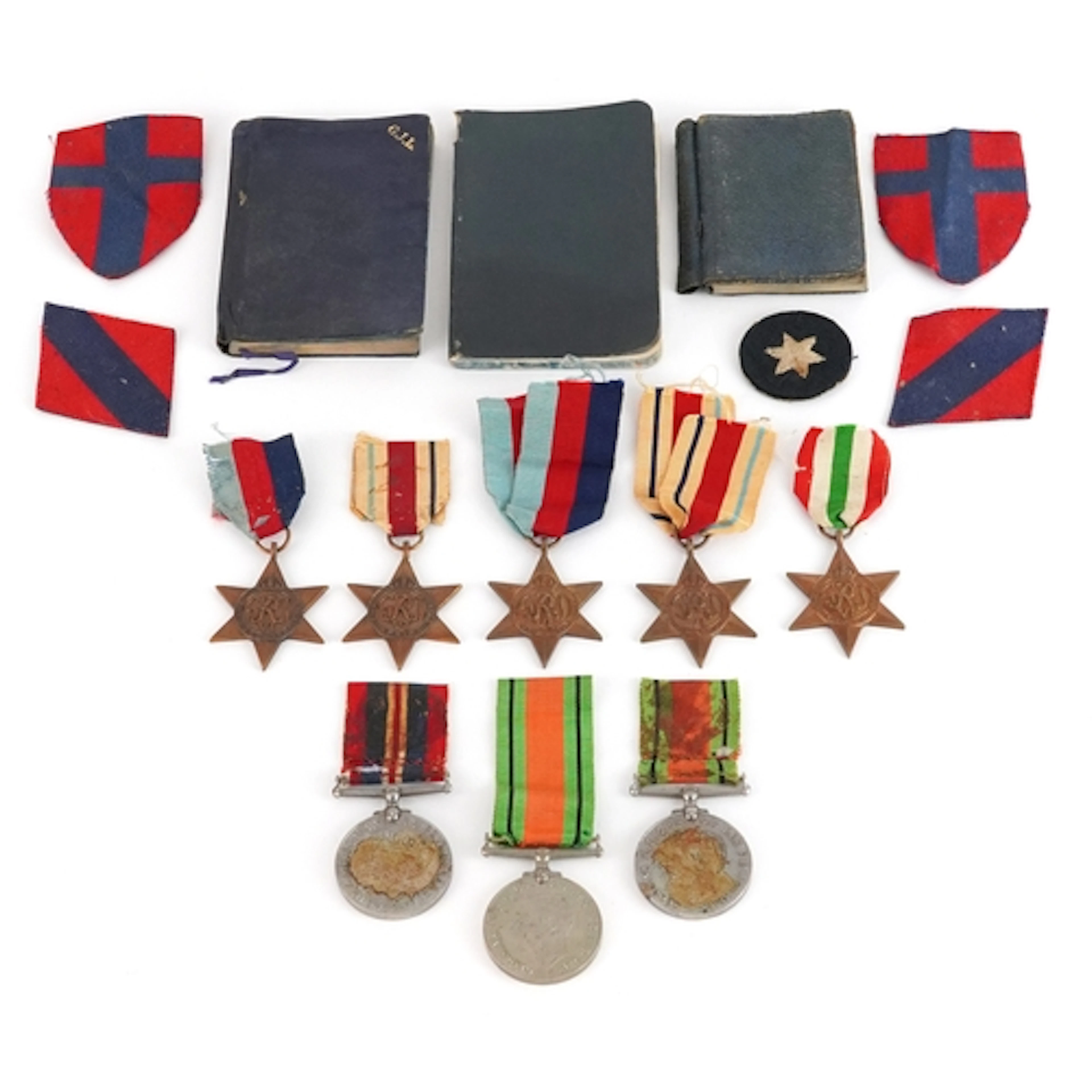 Group of British military World War II medals, cloth patches...
