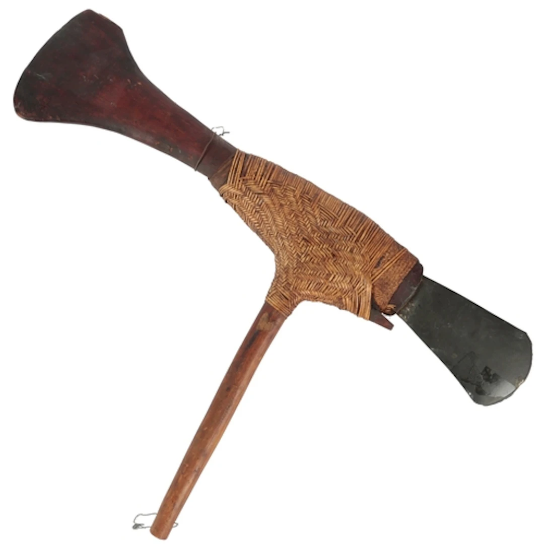 A Papua New Guinea volcanic stone mounted axe, Northern High...
