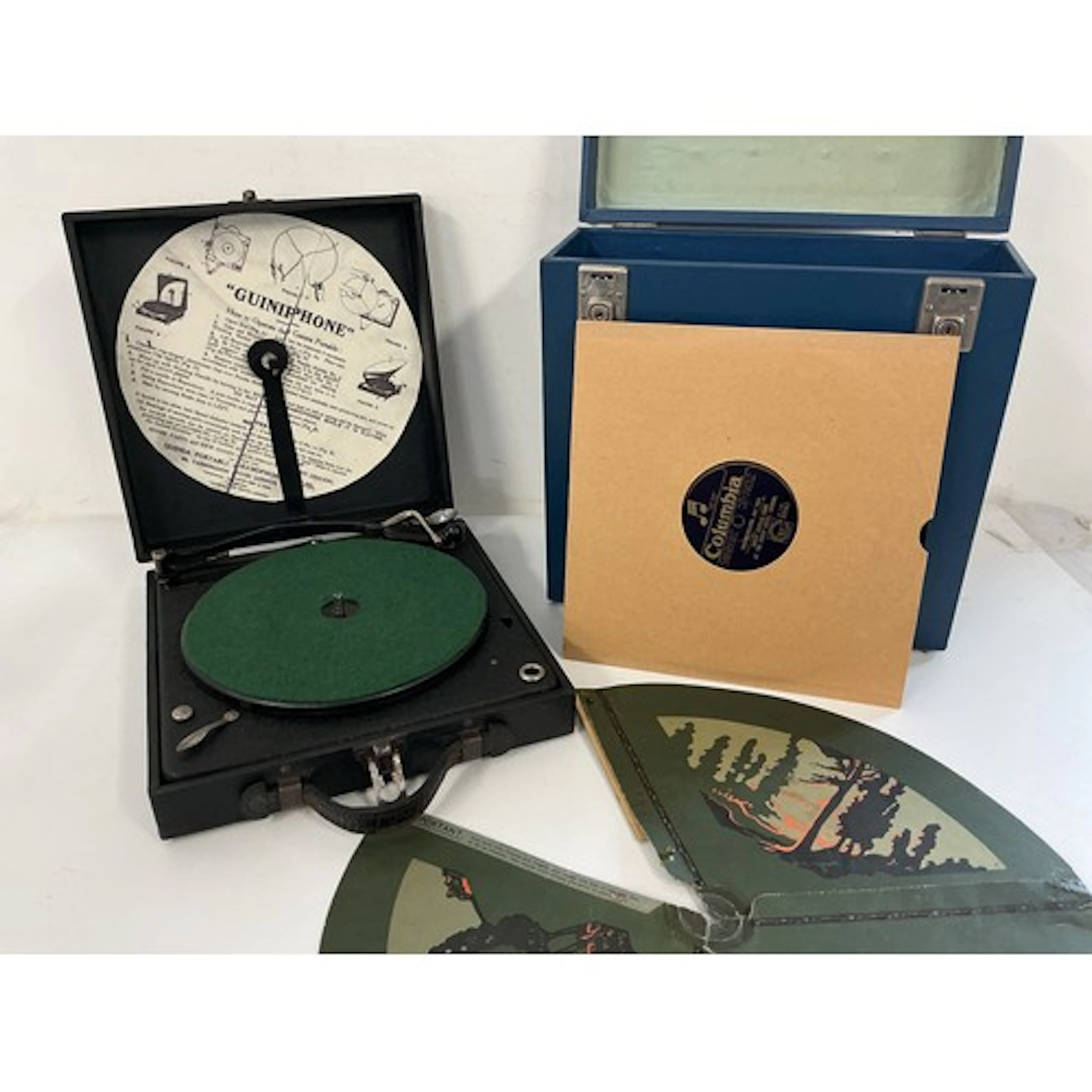 A Guinea ‘Guiniphone’ portable gramophone with original card...