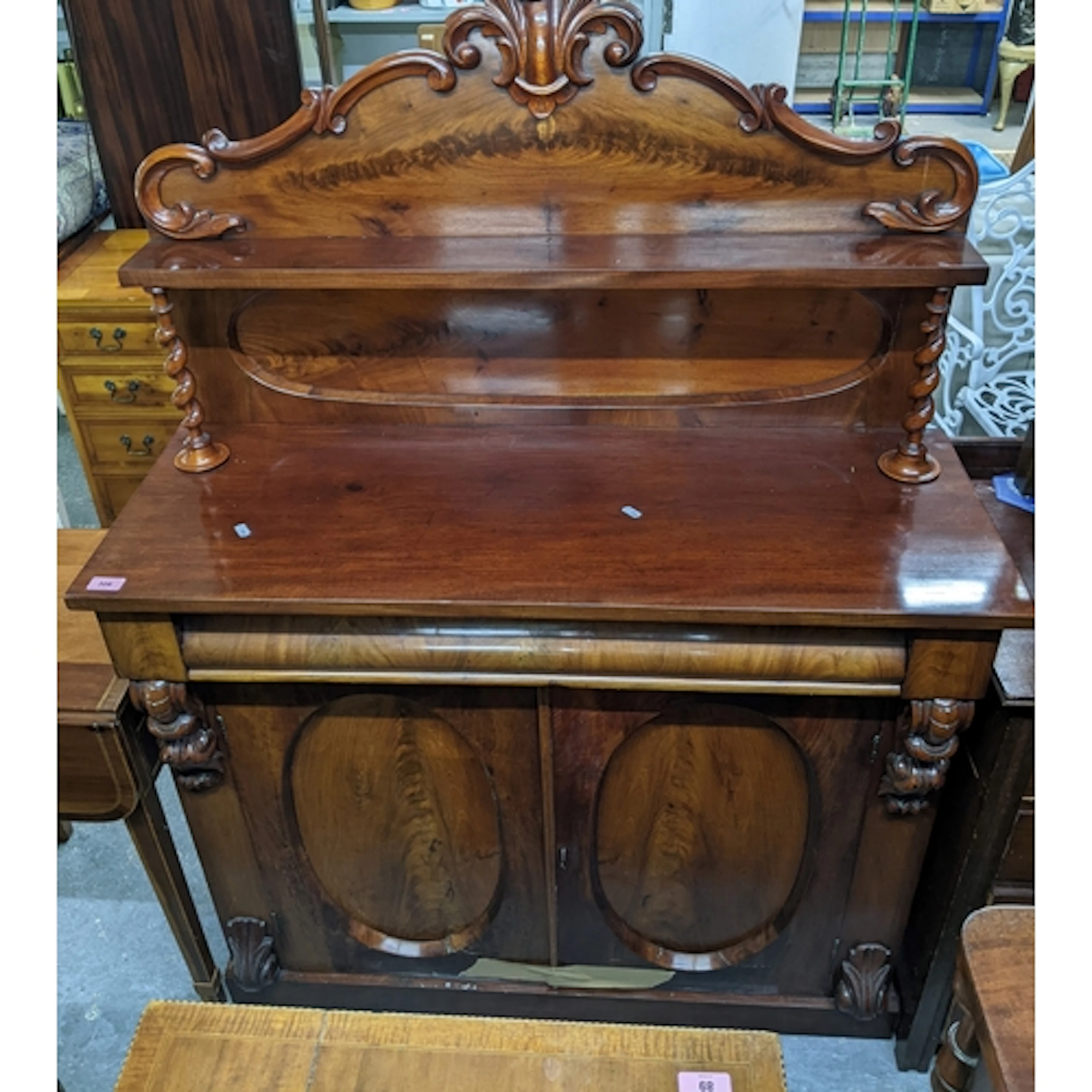 A Victorian mahogany chiffoniere, shelfed back with scrolled...