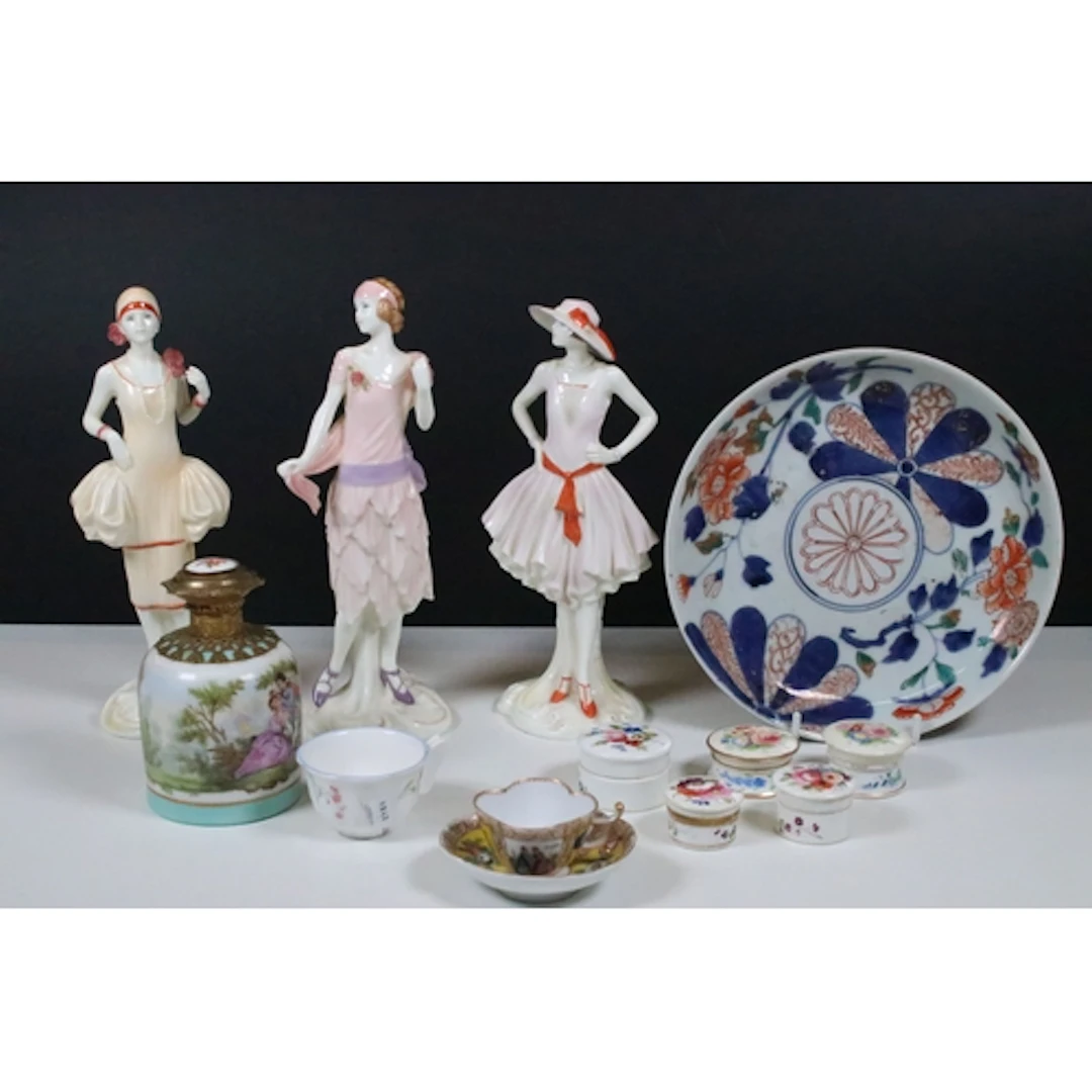 Group of three Royal Worcester Vogue collection figures, to ...