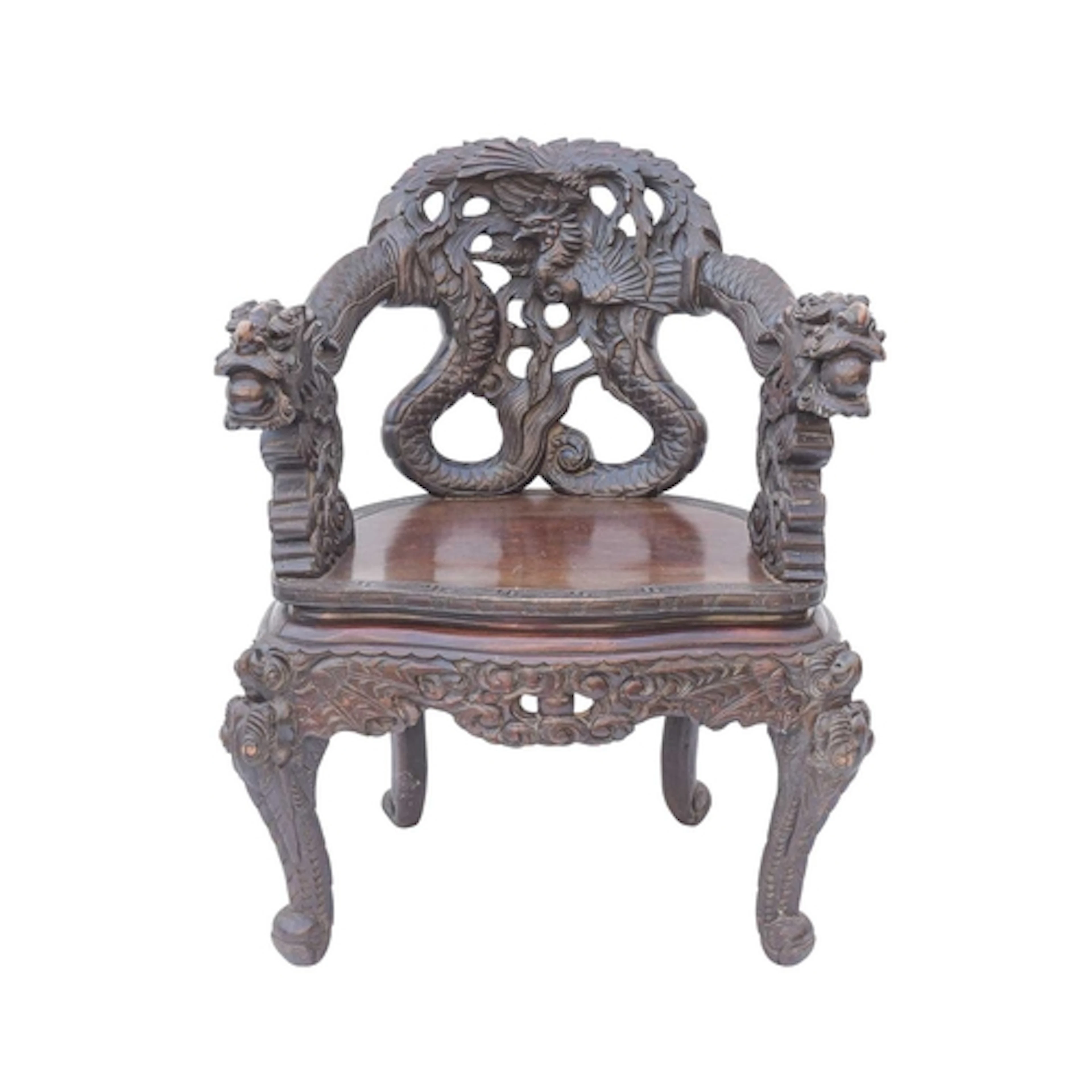 An ornate Chinese export heavily carved and lacquered dragon...