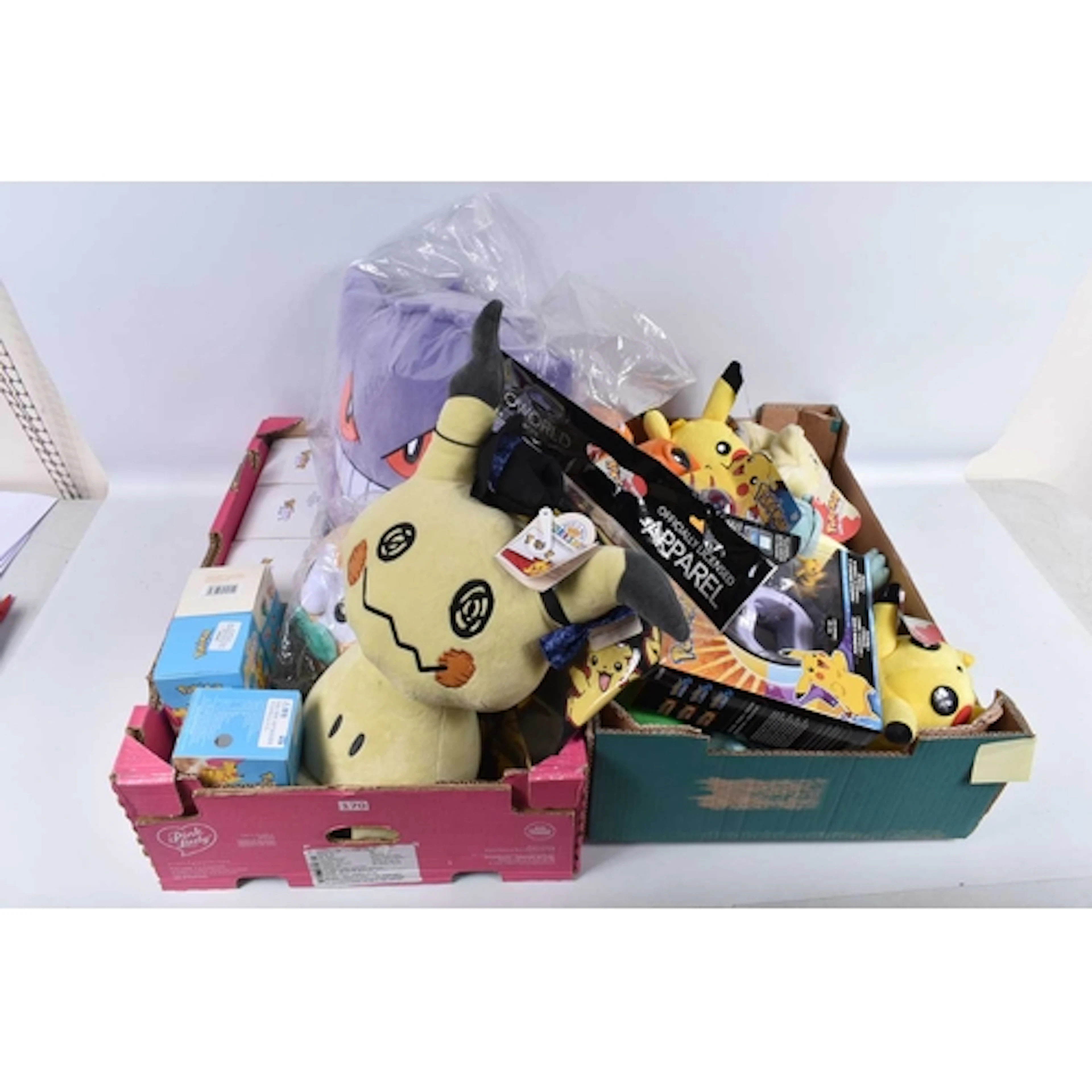 TWENTY-FIVE ASSORTED POKEMON ITEMS, to include Twelve plushi...