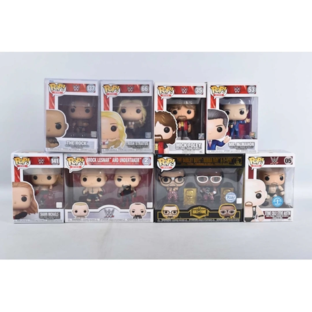 NINE BOXED FUNKO POP! WWE VINYL FIGURES, including a Stone C...