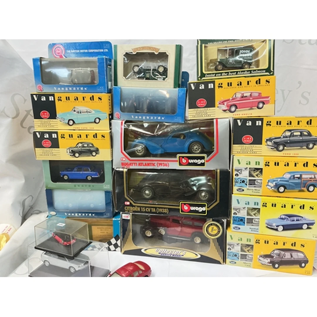 A Collection Of Boxed Vanguard's, Burago, And Loose Diecast....