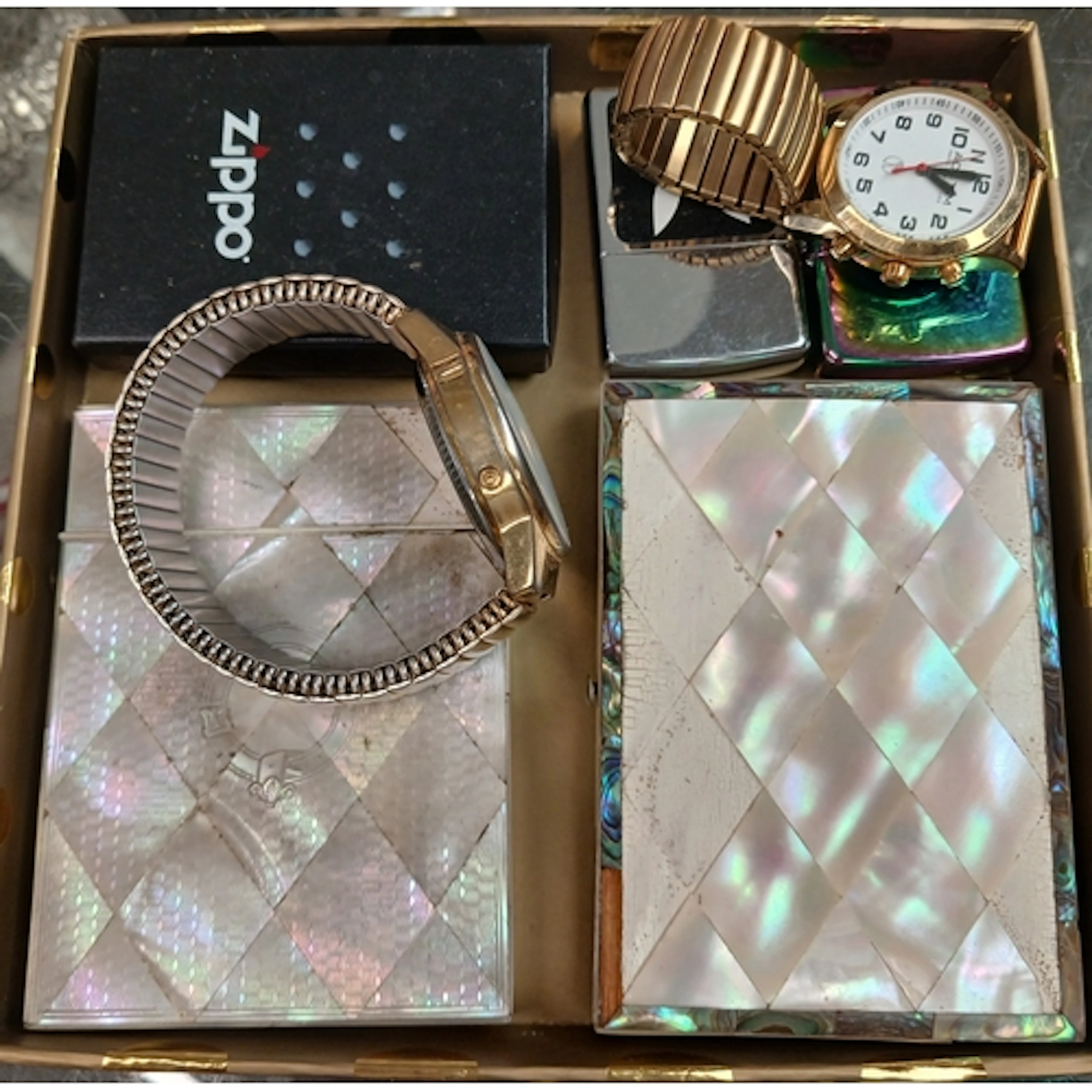 A tray including two mother of pearl card cases, two watches...