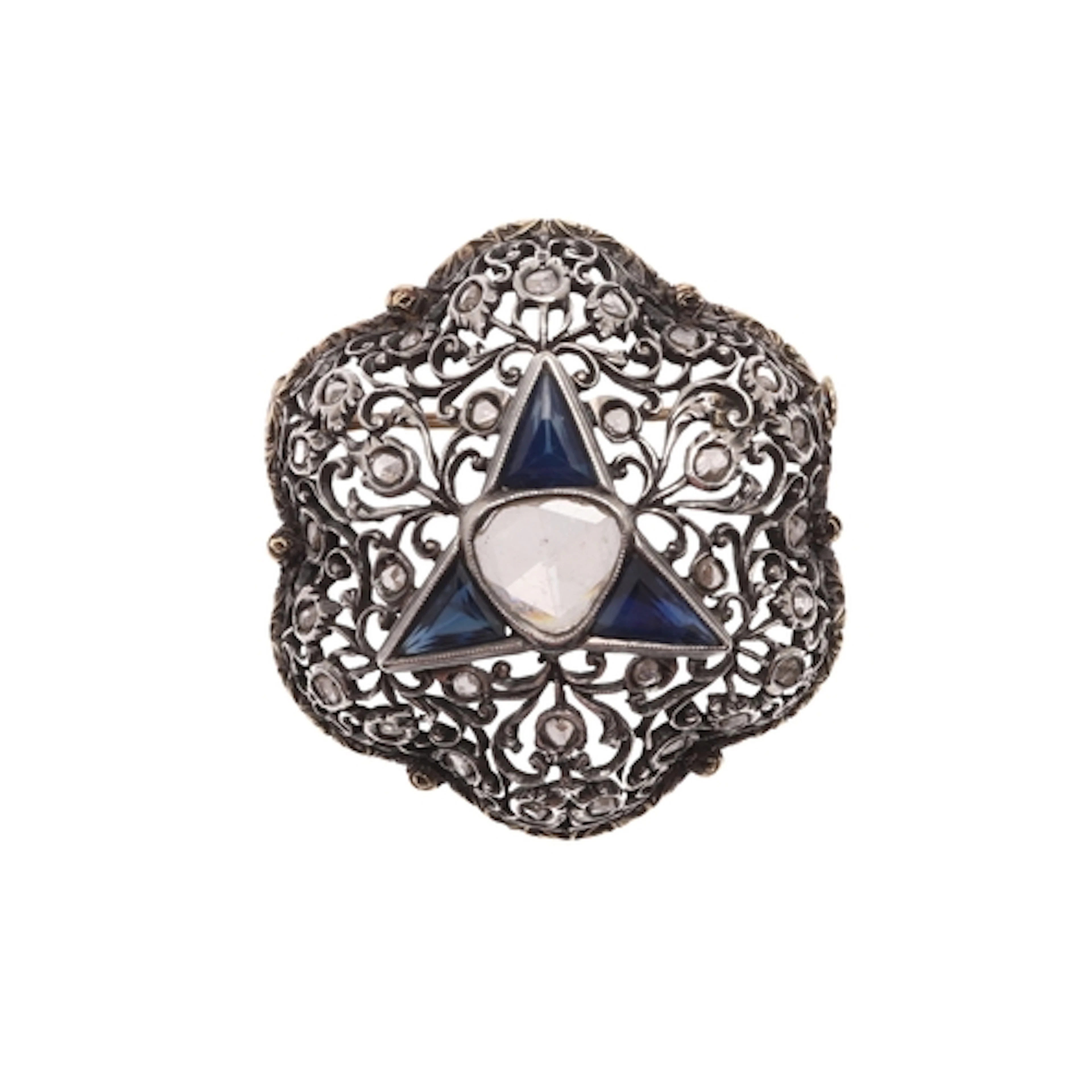 A SAPPHIRE AND DIAMOND BROOCH. the foliate scrolling openwor...