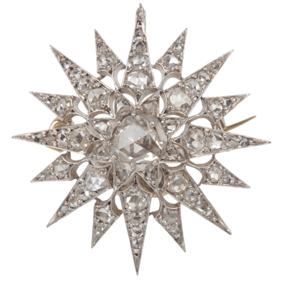 A Victorian diamond brooch, late 19th century, designed as a...