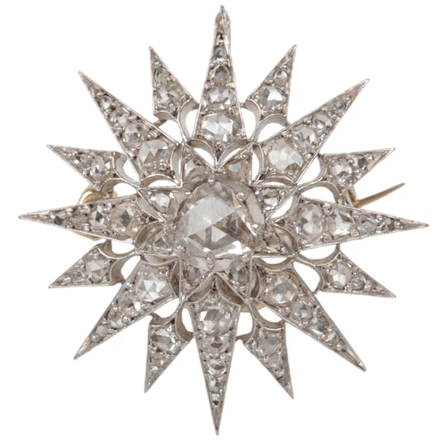 A Victorian diamond brooch, late 19th century, designed as a...