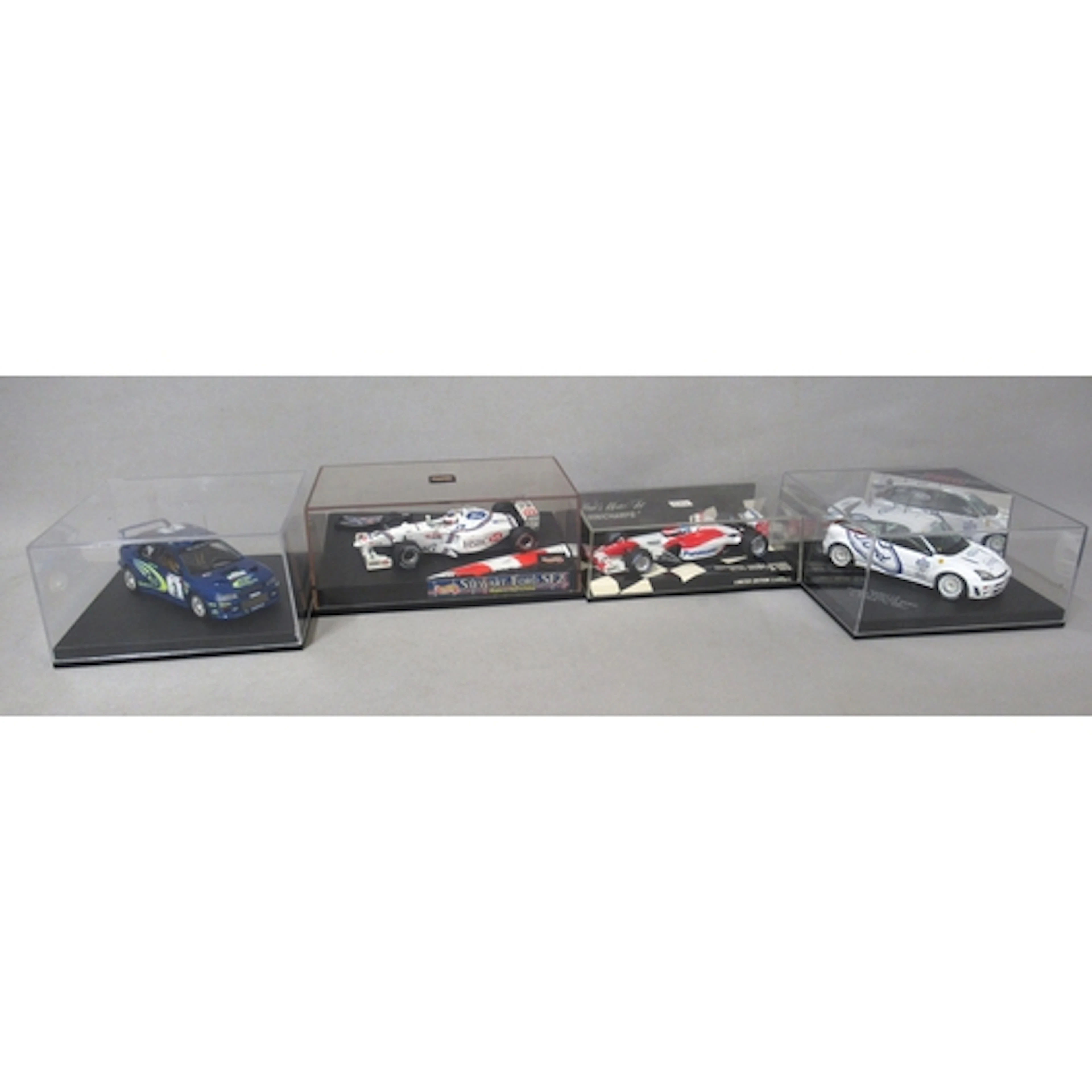 Quantity of 1:43 scale model cars, mainly sports and Formula...