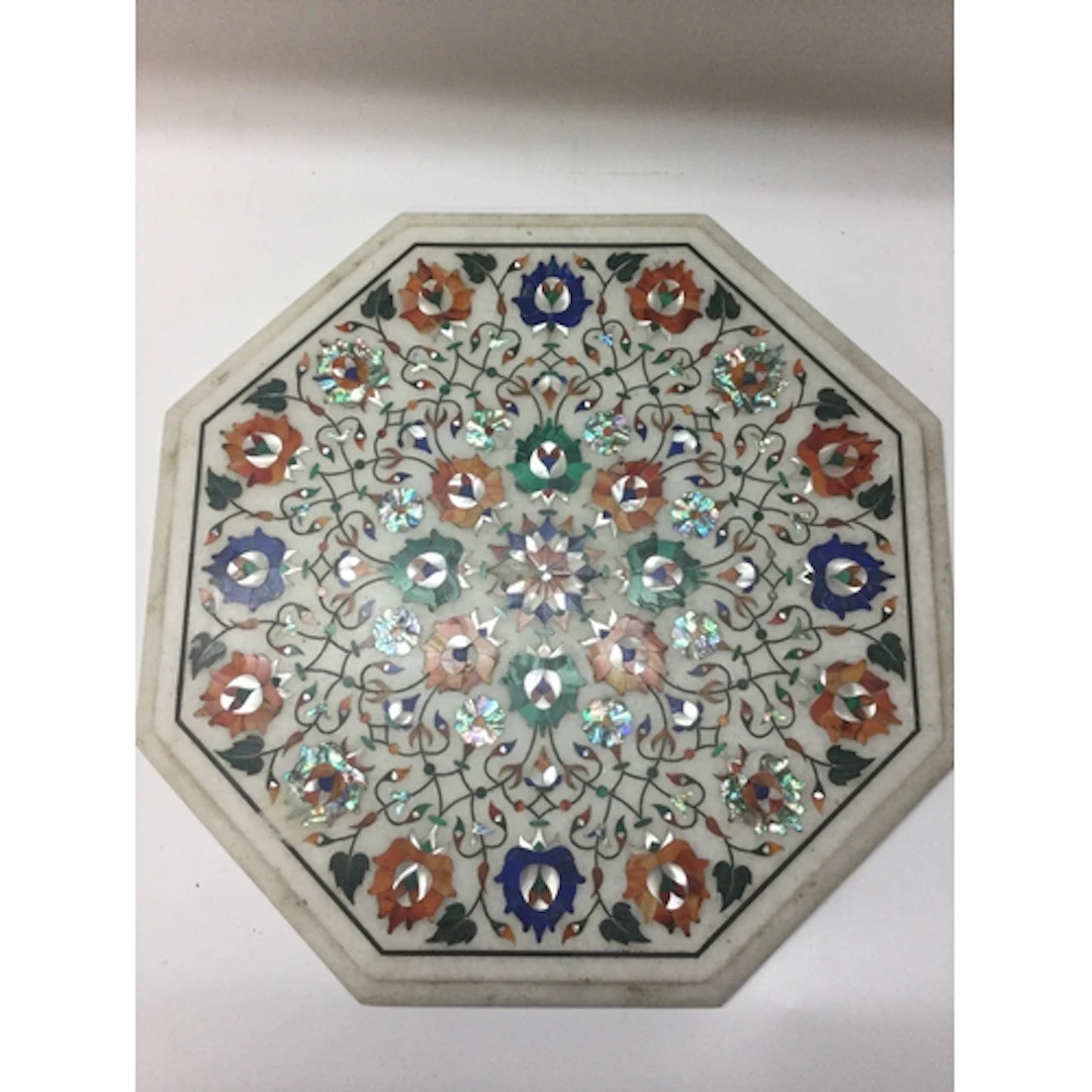 A fine Indian Pietra Dura Inlaid White Marble octagonal tabl...