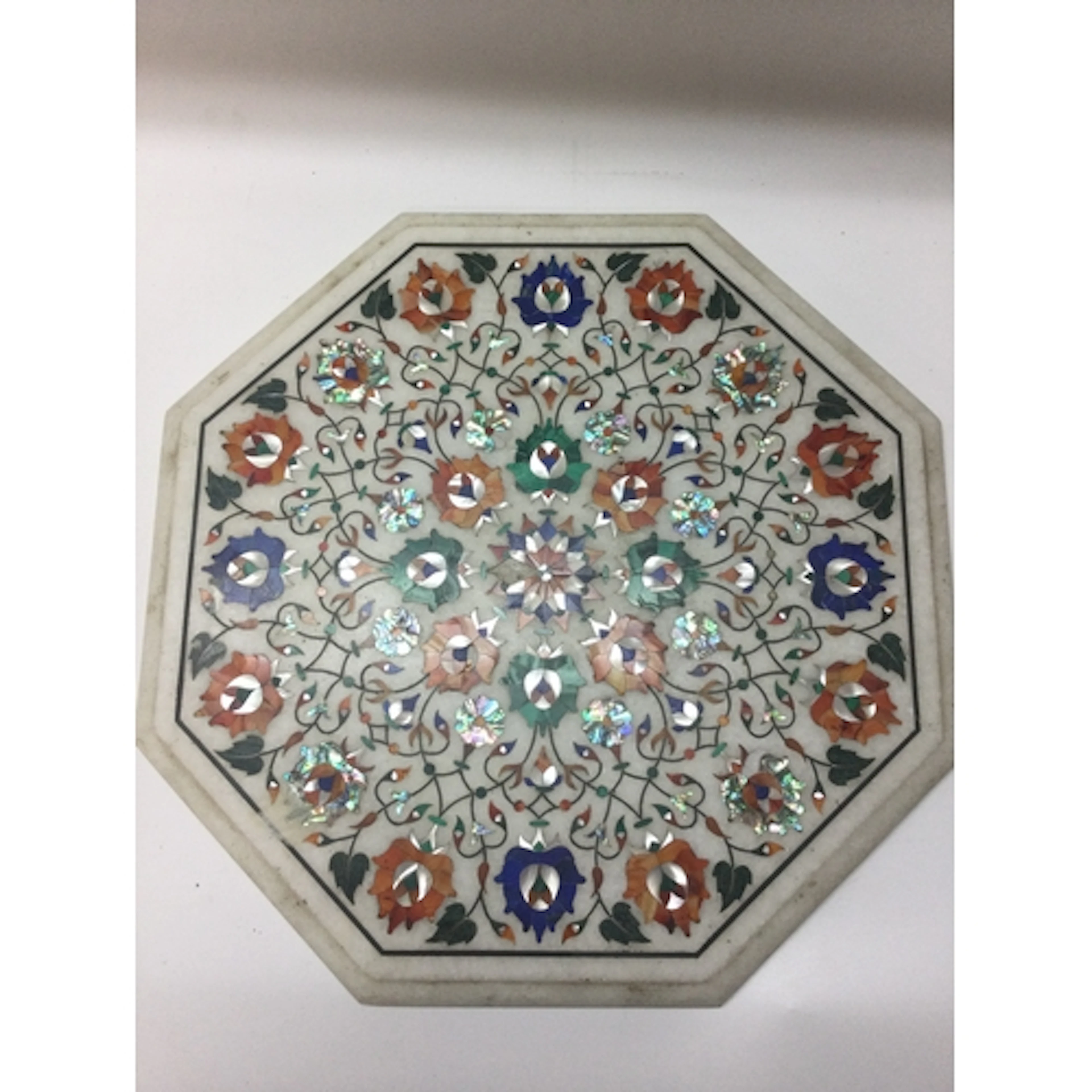 A fine Indian Pietra Dura Inlaid White Marble octagonal tabl...