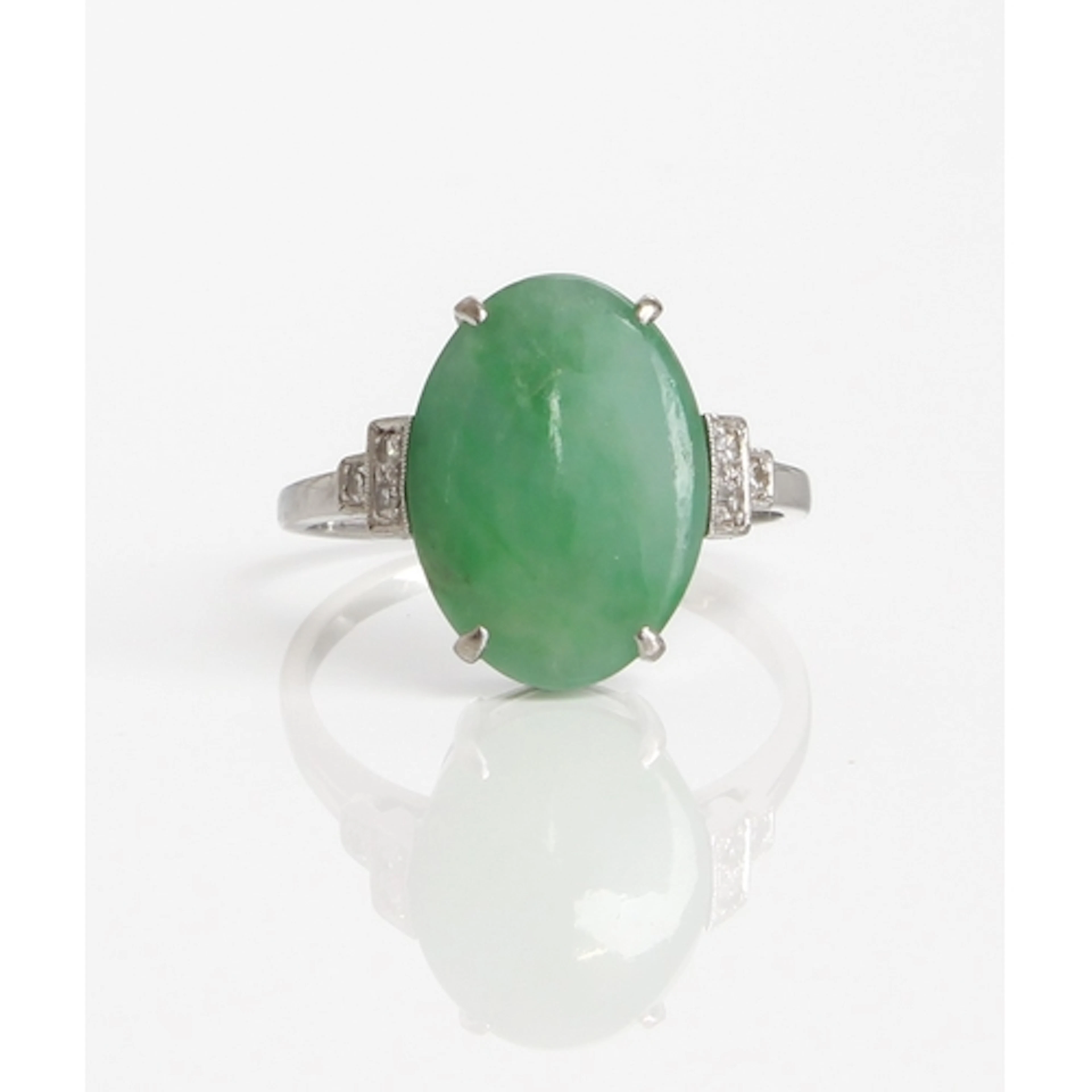 A mid-century Art Deco style 18ct white gold, jade and diamo...