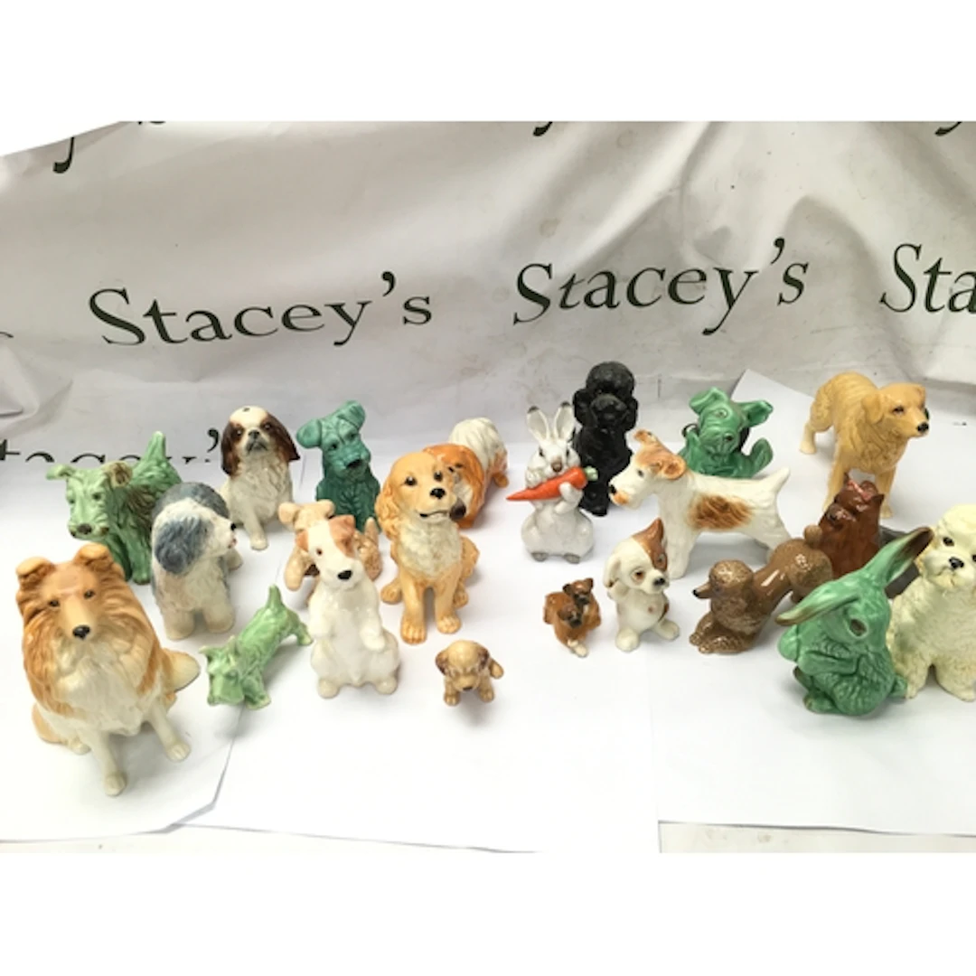 vintage ceramic and porcelain dog and rabbit figurines, like...