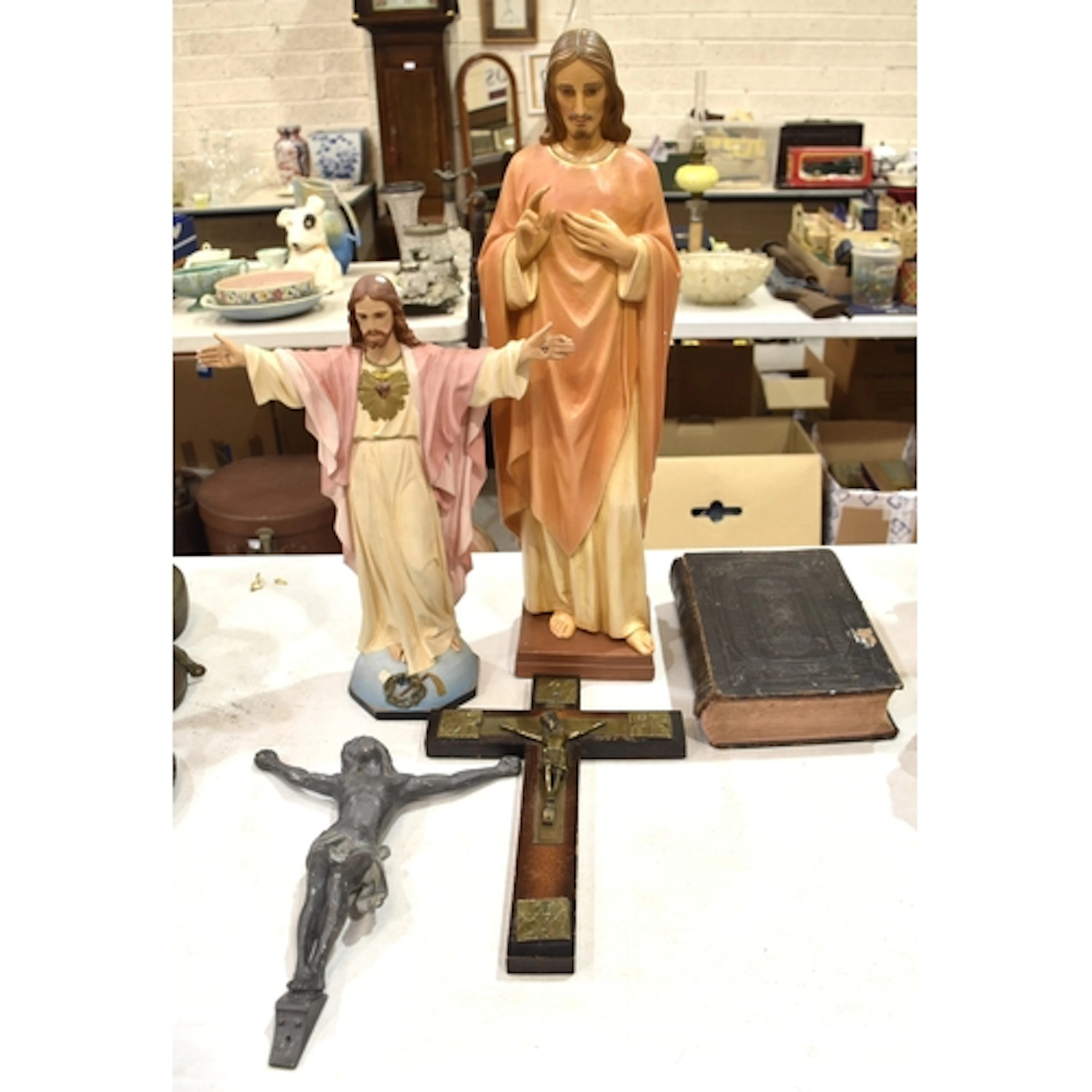 A lead Corpus Christi figure, 32cm high, a brassed metal and...