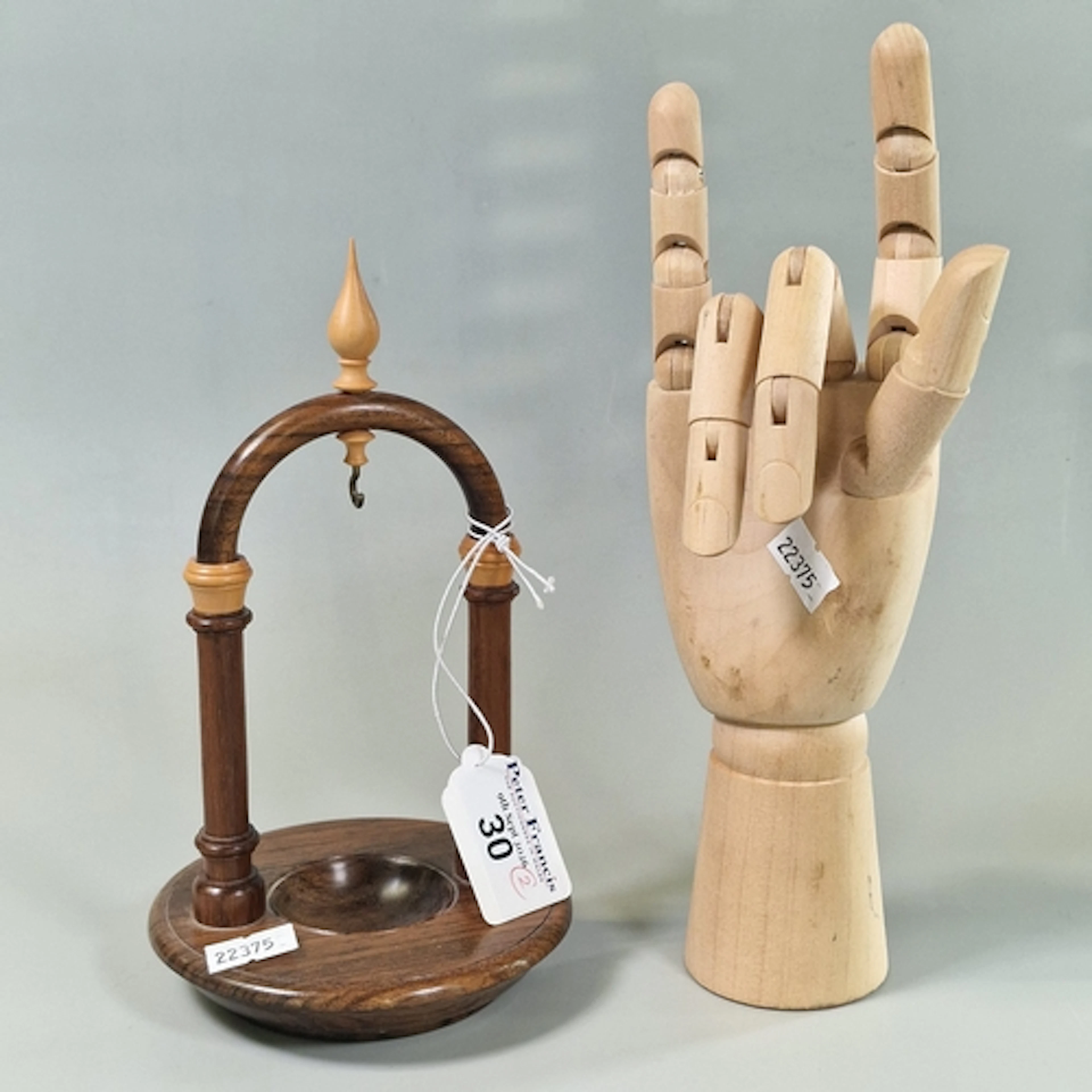 Articulated wooden artist's hand mannequin, with moveable fi...