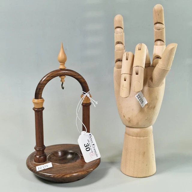 Articulated wooden artist's hand mannequin, with moveable fi...