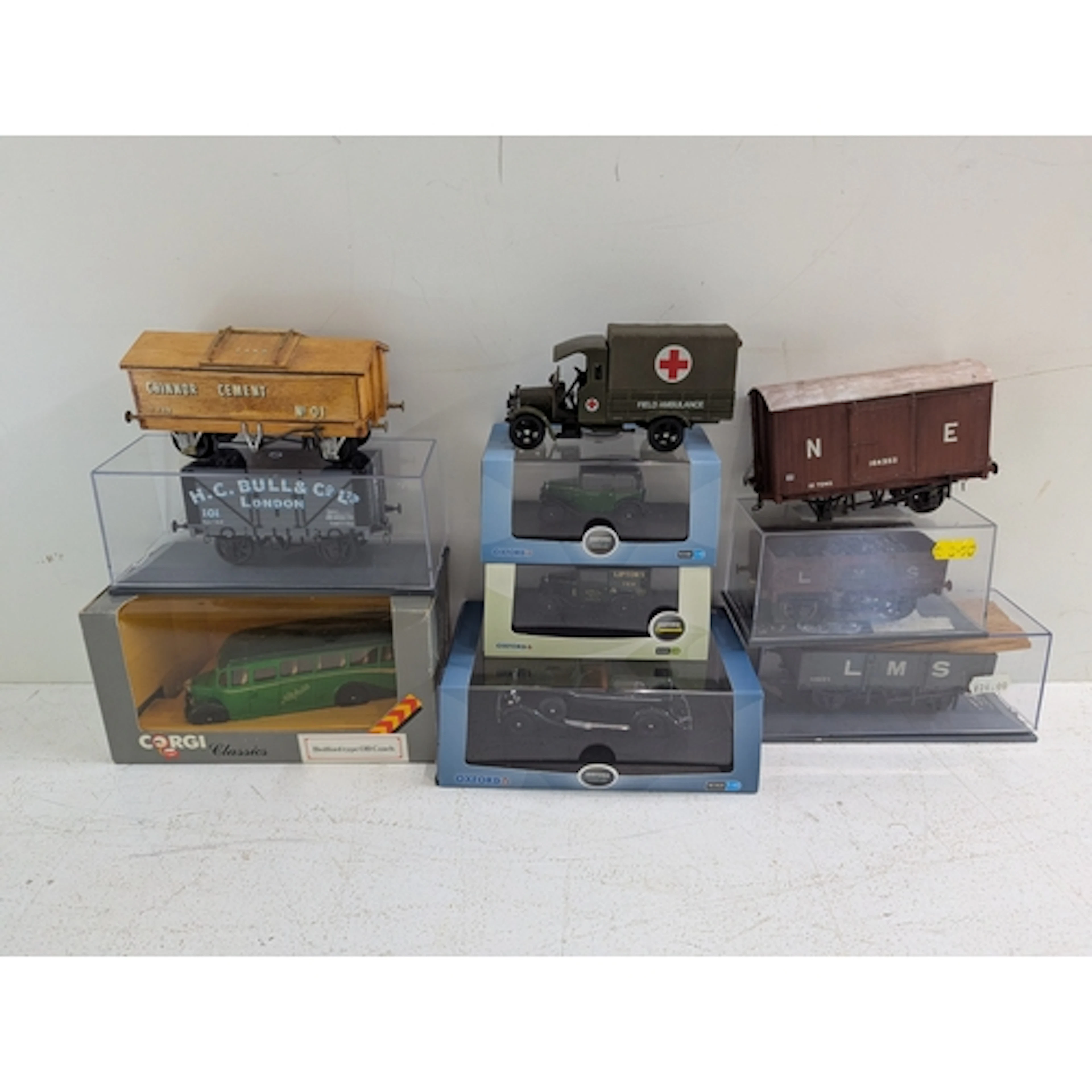 Three Oxford model vehicles, a Corgi classics bus, a Corgi a...