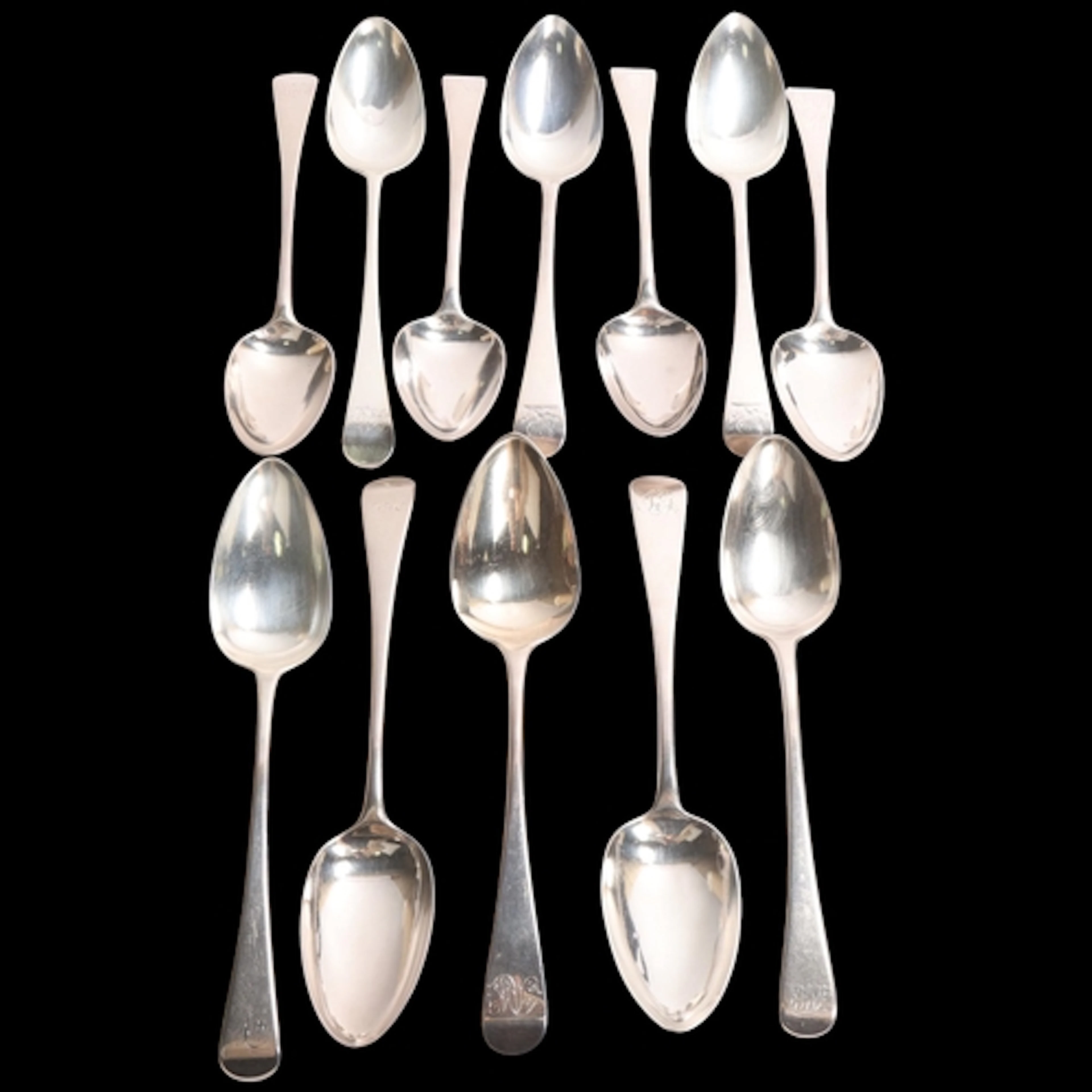 A matched set of 12 George III Old English pattern tablespoo...