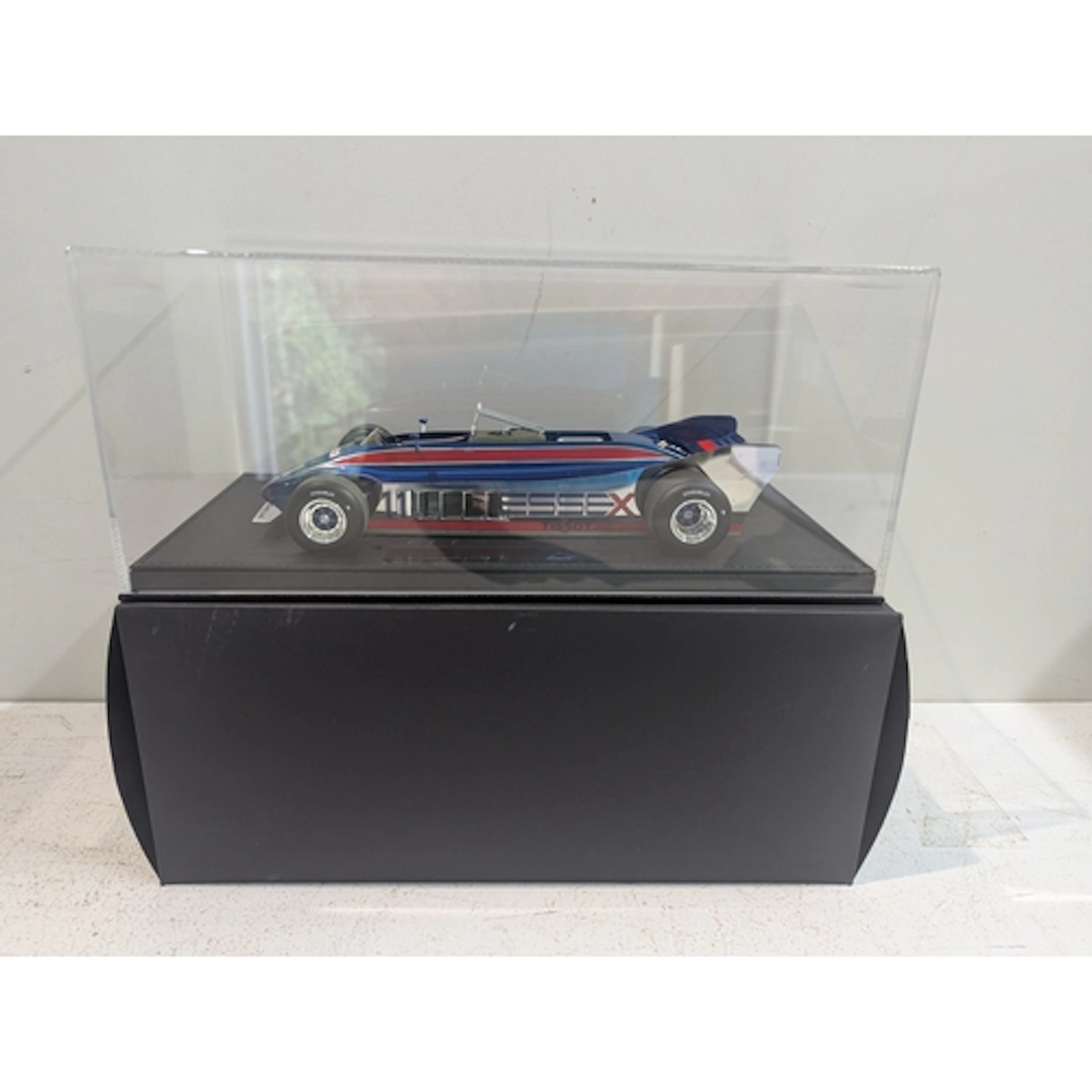 A GP Replica model 1:18 scale of the Lotus 88 #11 driven by ...