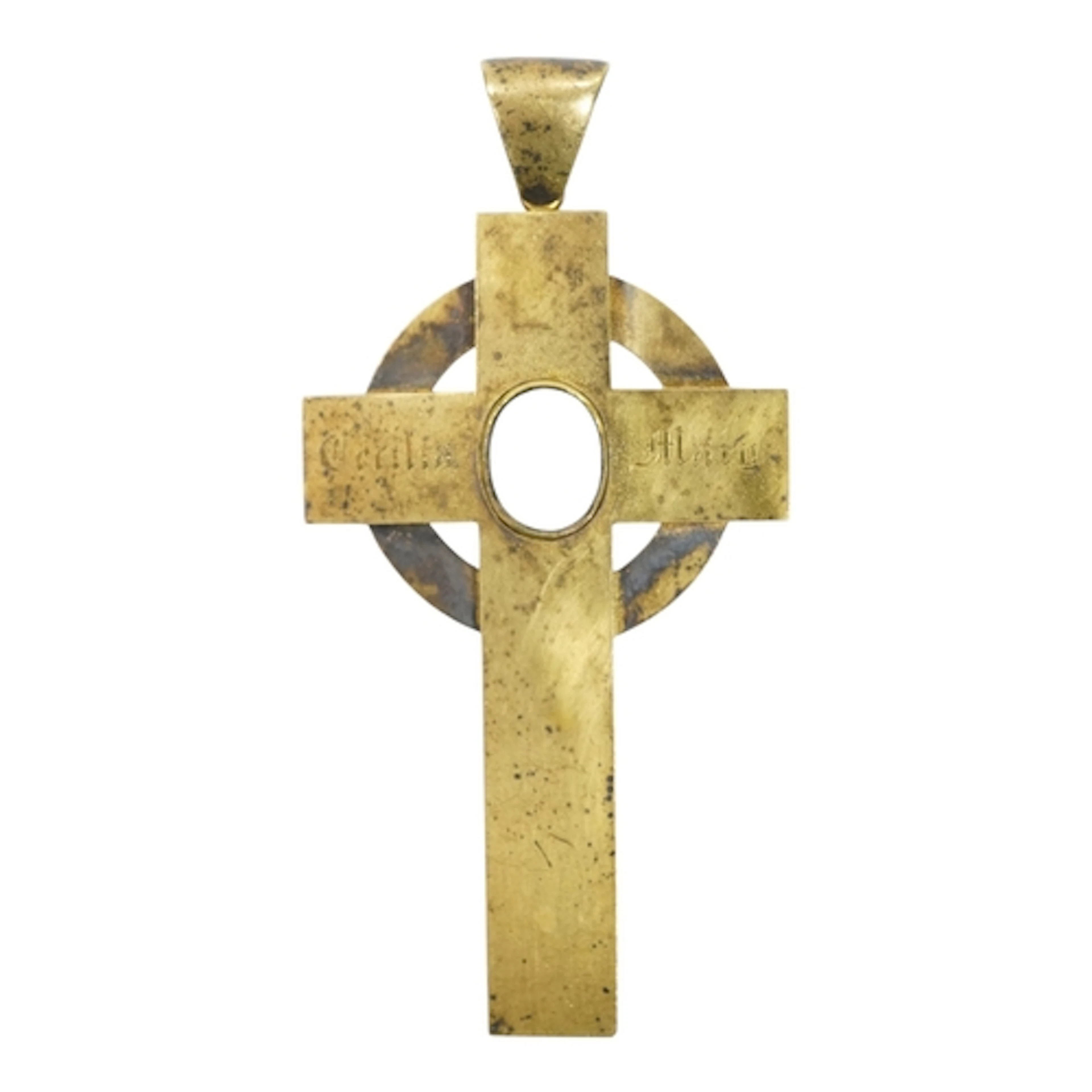 A gold cross pendant, circa 1871, designed as a Celtic cross...