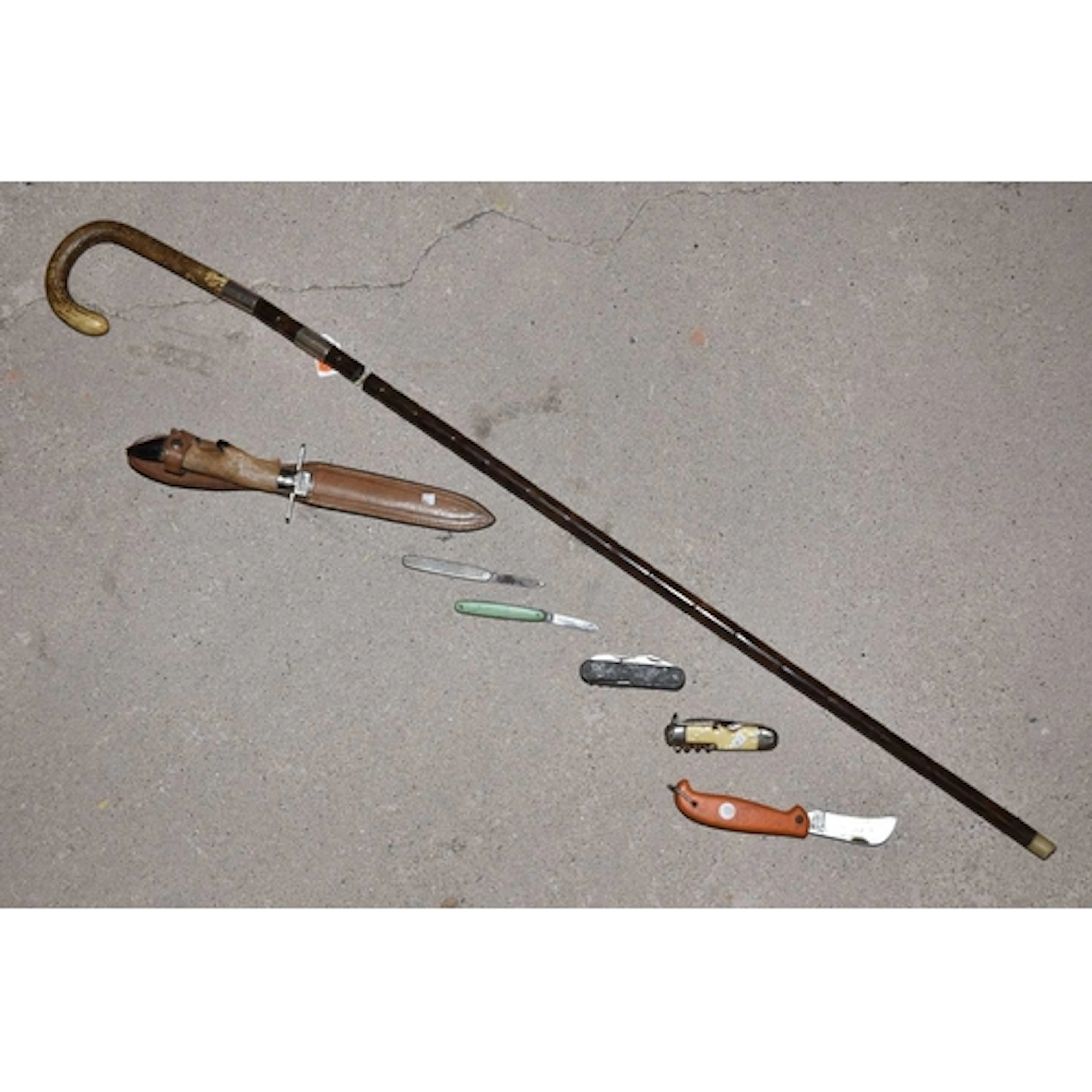 An Edwardian bamboo sword stick, the curved handle covered i...