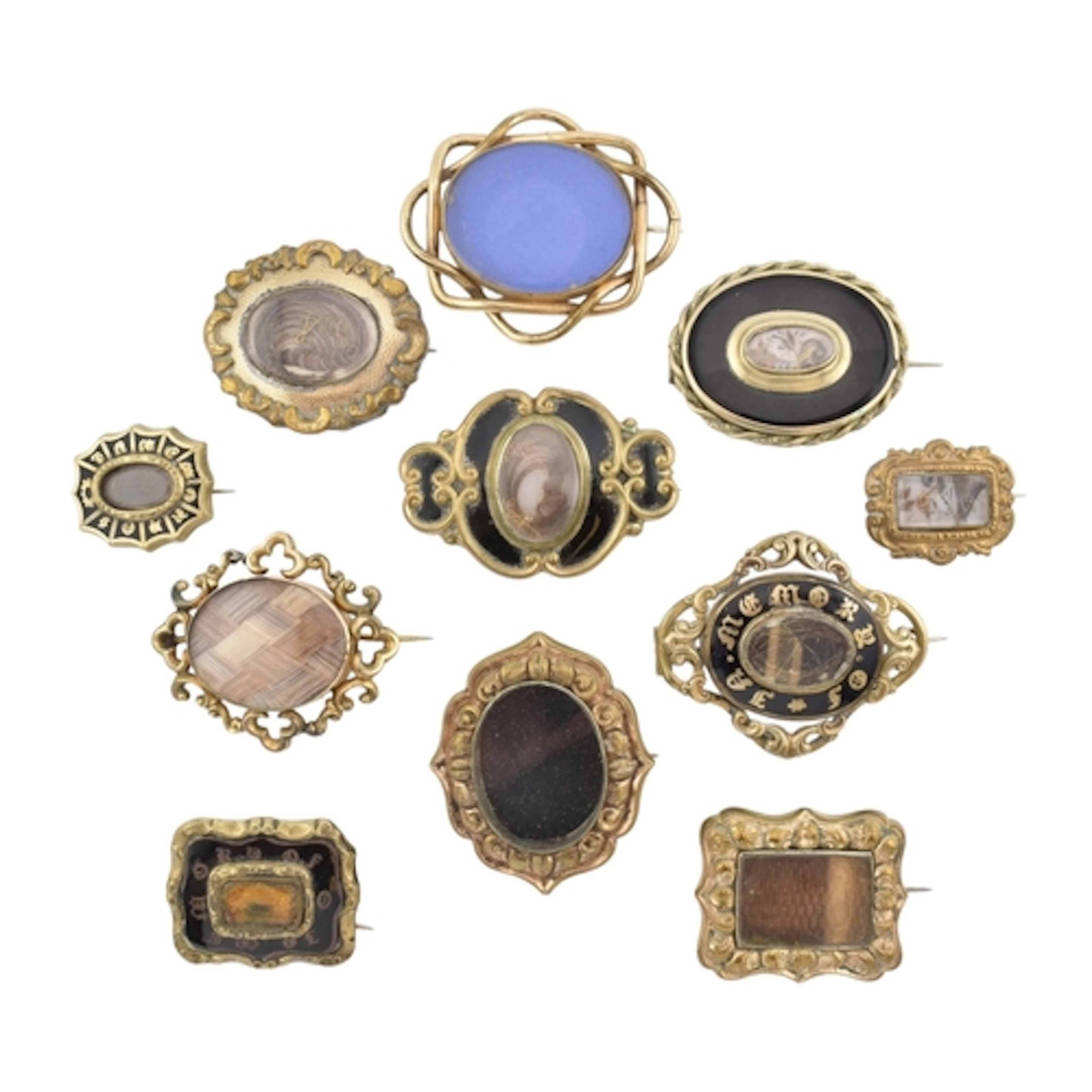 A collection of 19th century mourning hair locket brooch pin...