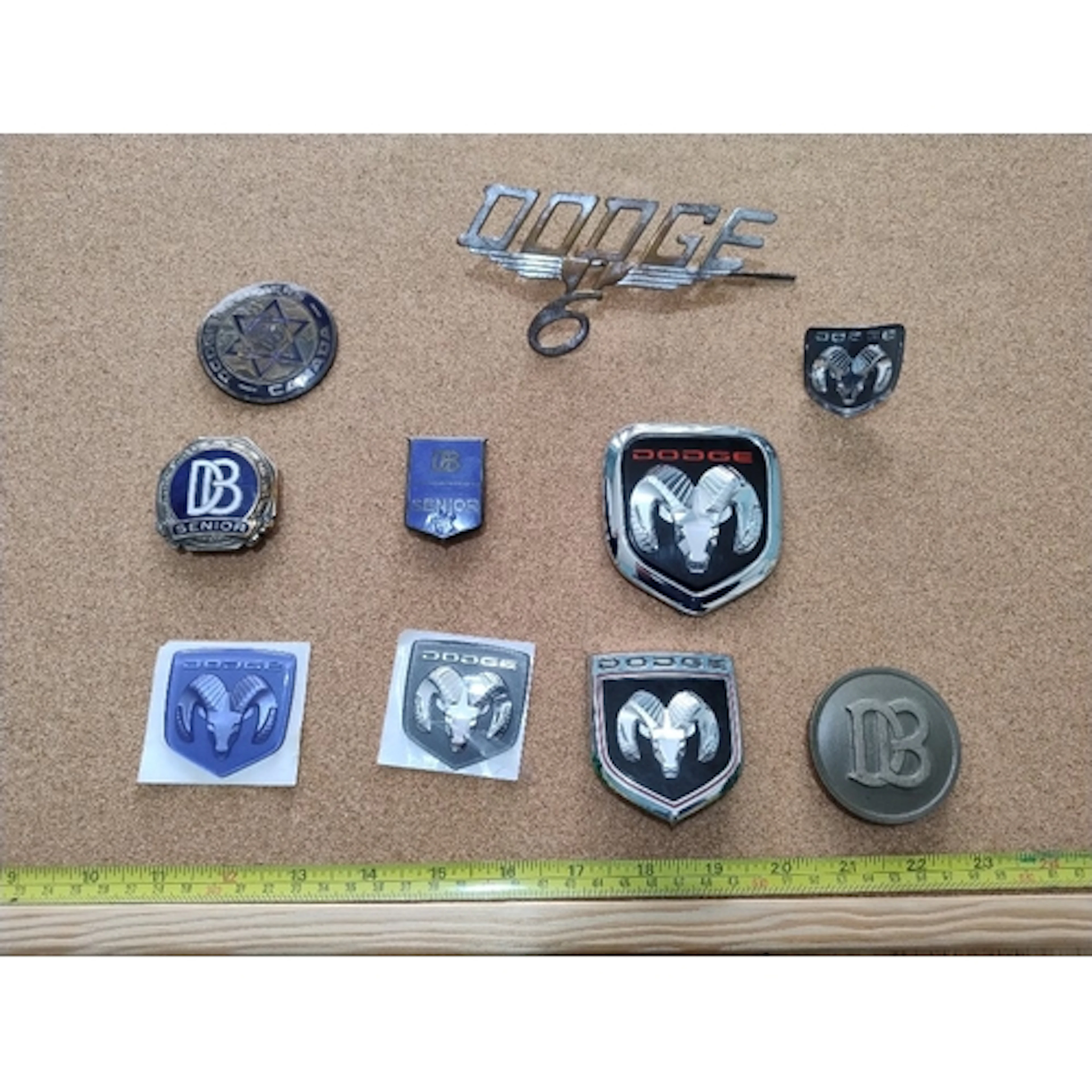 Ten USA Dodge car badges including Dodge 6, Canada , Ram, Se...