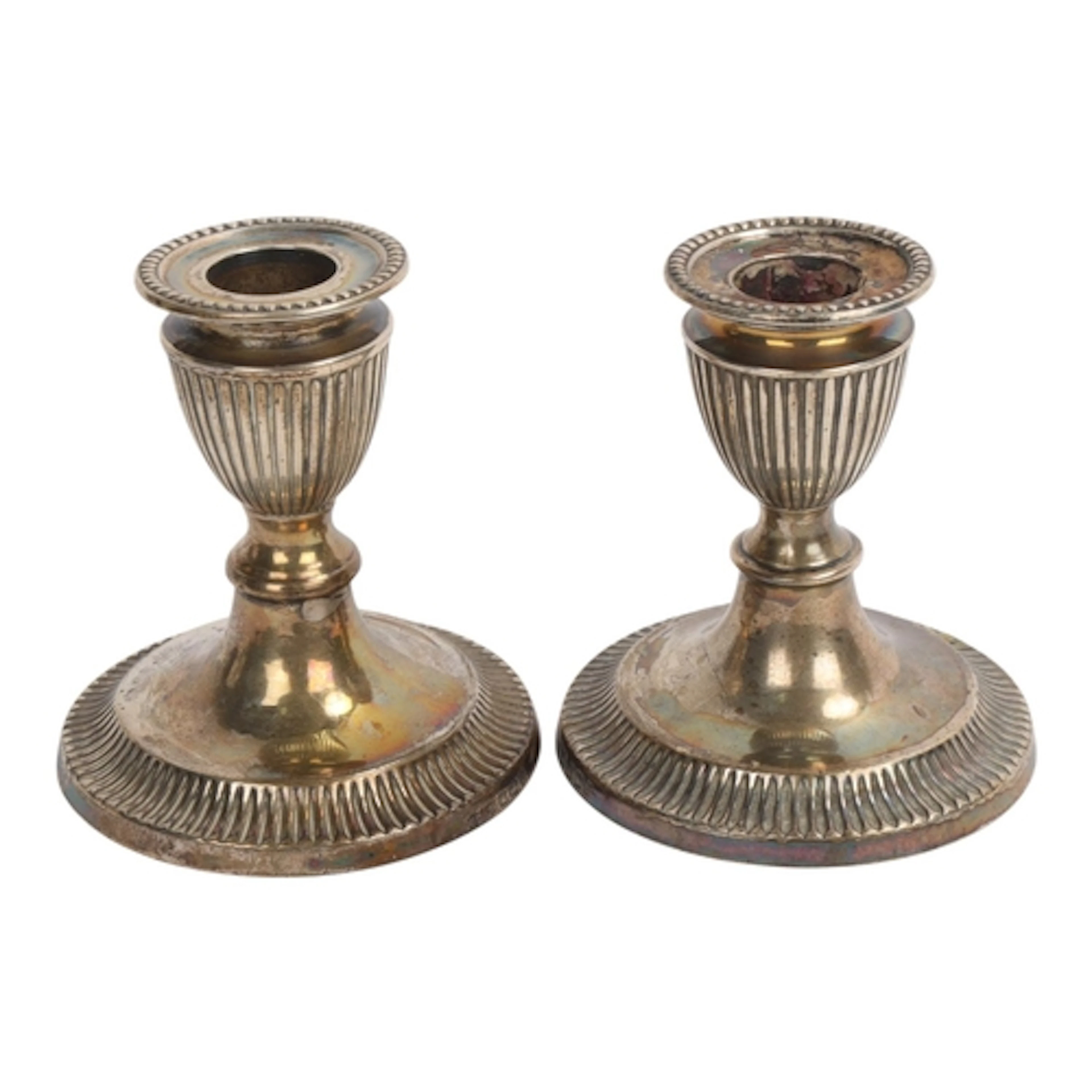 A pair of late Victorian silver squat table candlesticks, Ja...