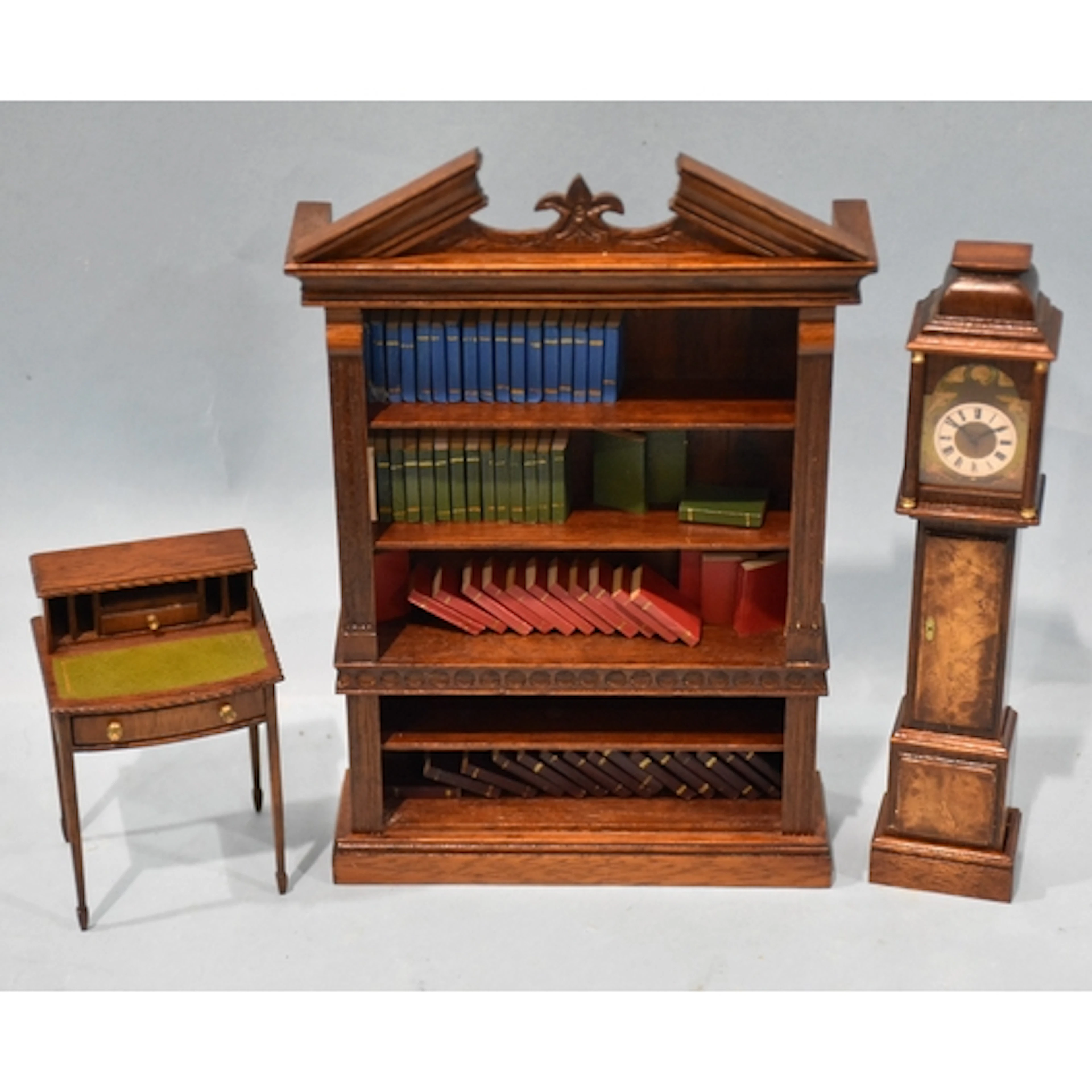 Dennis Jenvey, a doll's house breakfront bookcase with pedim...