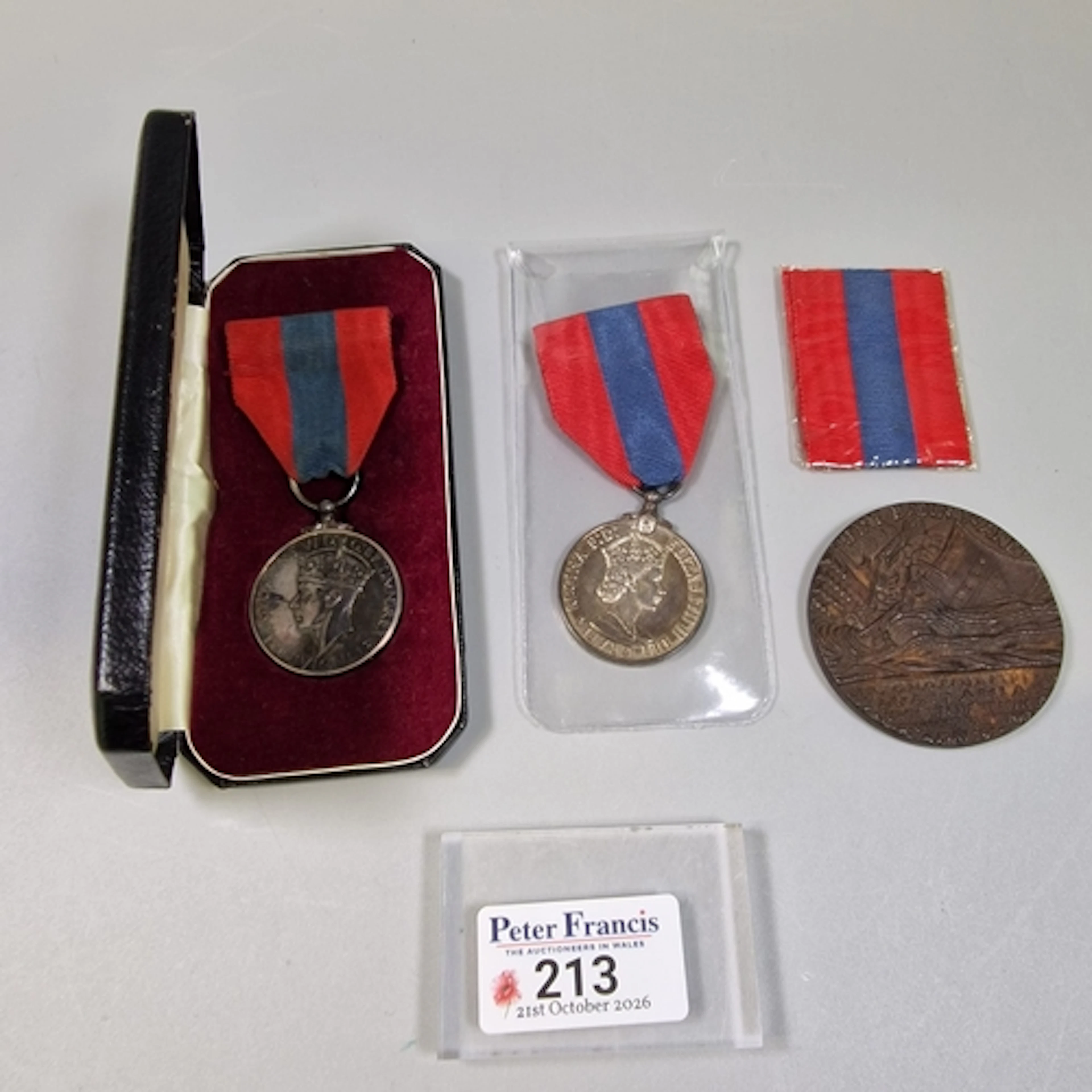 Two British Imperial Service Medals, awarded for long and me...