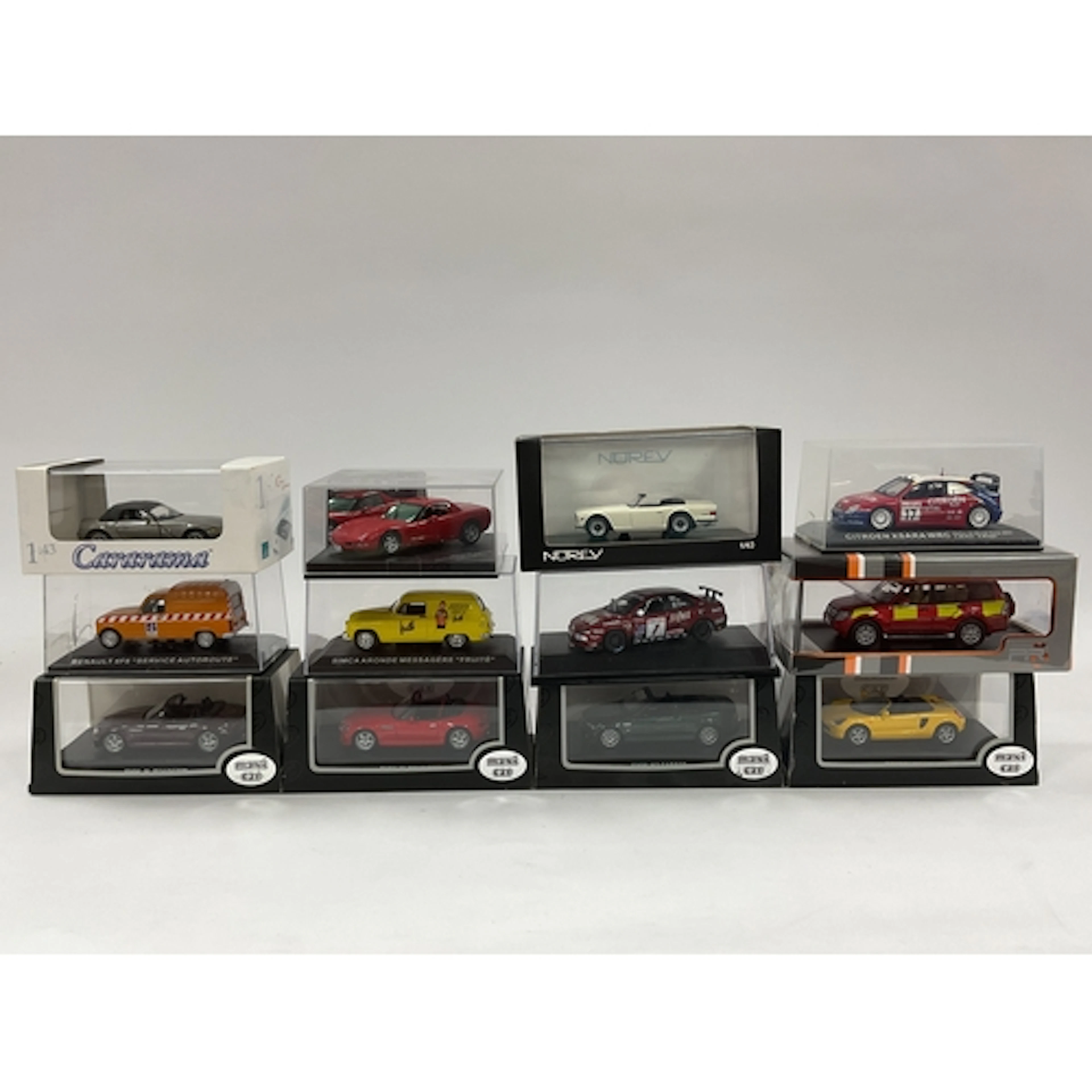 Twelve 1:43 scale diecast model cars by Maxi Car, Norev, Ixo...