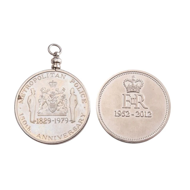A Metropolitan Police 150th Anniversary medal and an ERII Di...